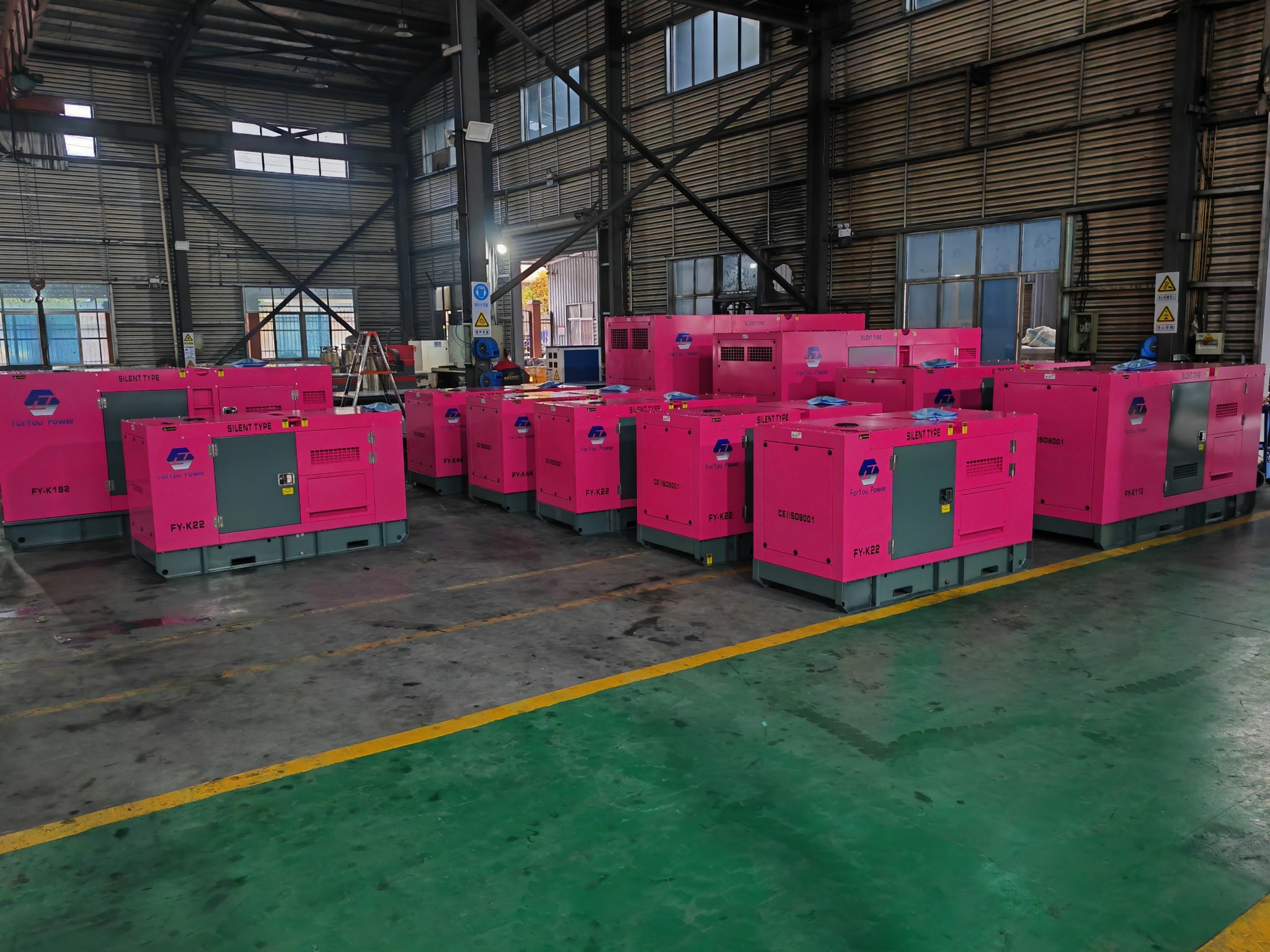 Custom color silent diesel generators ready for inspection