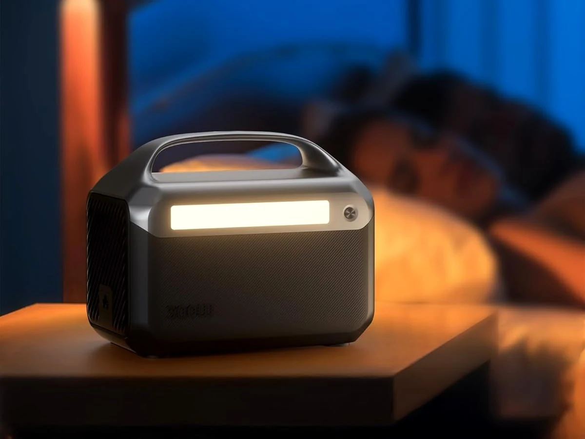 Portable power station lighting a bedroom during a night-time power cut