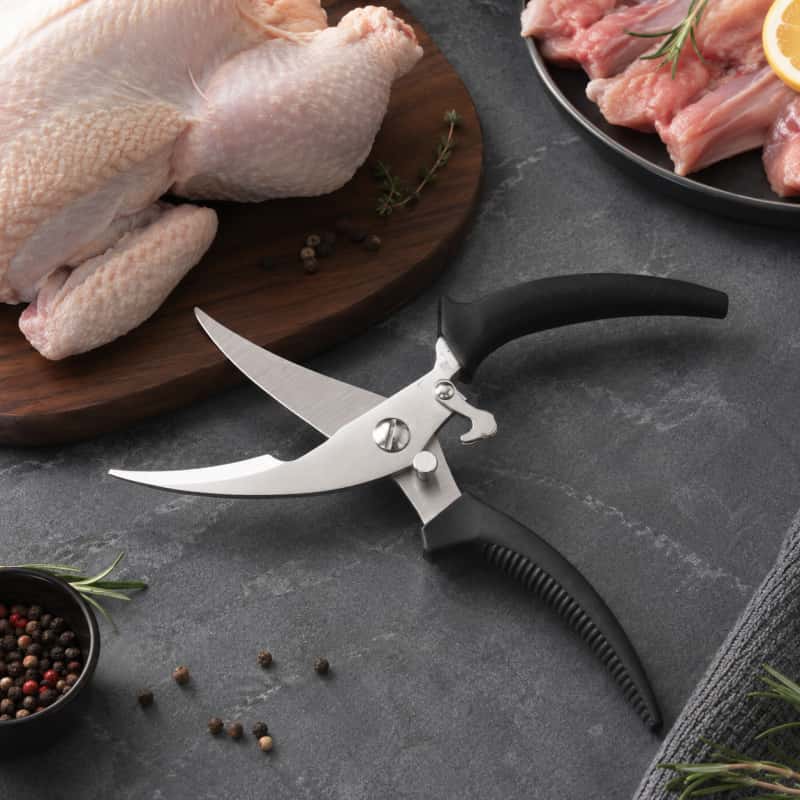 Heavy duty poultry shears with lever action and stainless steel blades for poultry and bone cutting