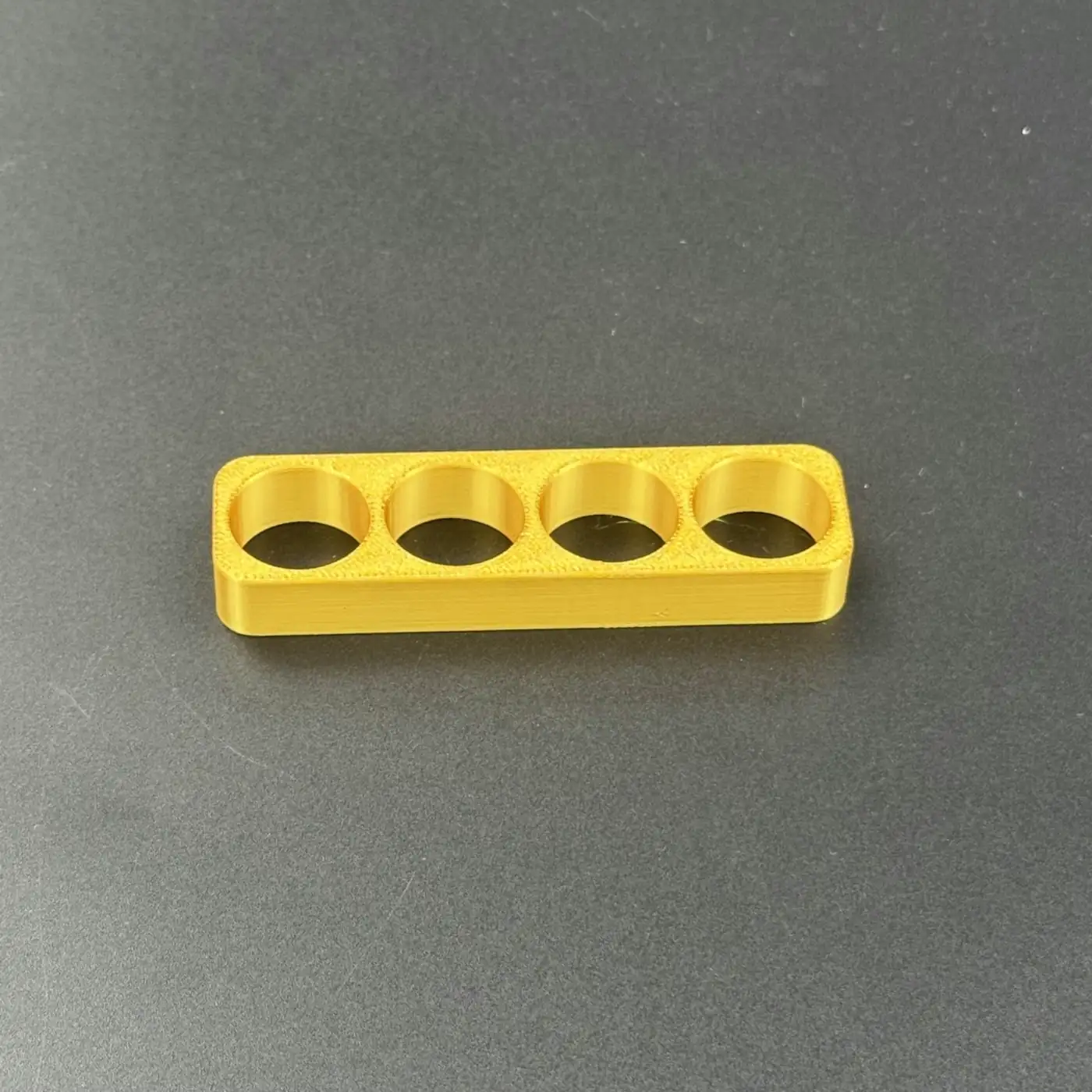 removable gold-finish four-cavity PETG insert for the 4 slot linear 3ml vial case