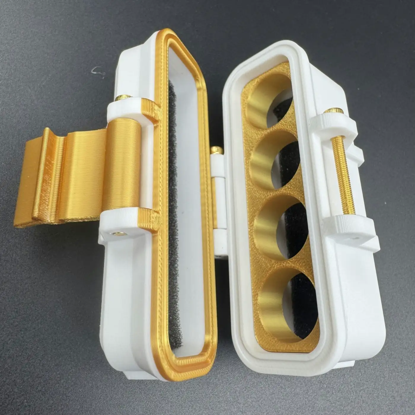 open 4 slot linear 3ml vial case at an angle showing gold insert and foam-lined lid