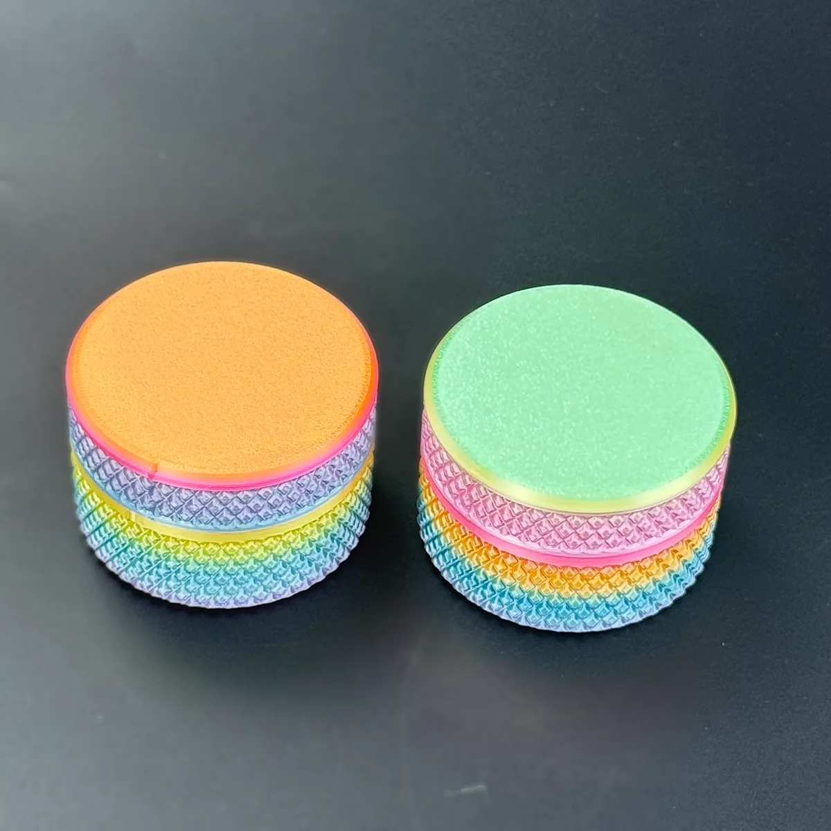 the finished swap: orange lid on one gradient case and mint lid on the other