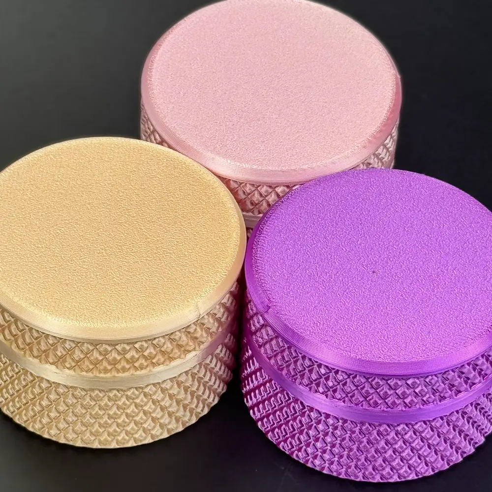 champagne, rose pink and purple solid vial cases together