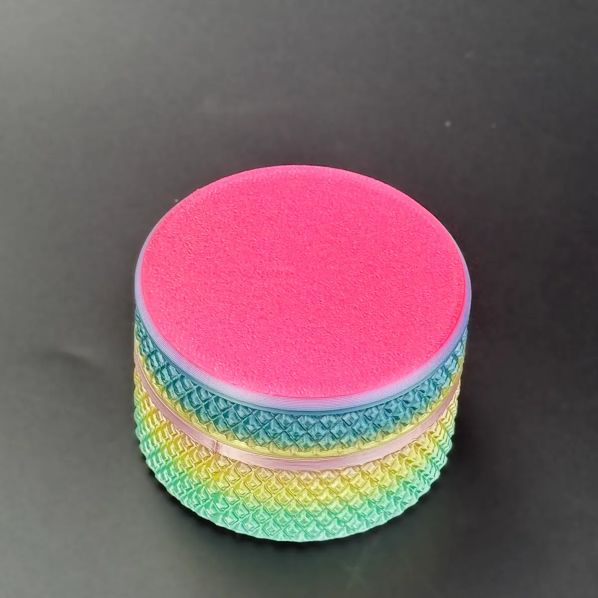 fuchsia lid on a rainbow gradient shell, one assembled pairing