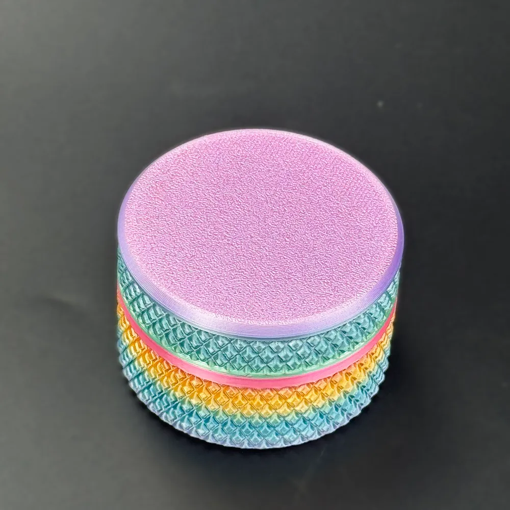 purple lid on a rainbow gradient shell, one assembled pairing