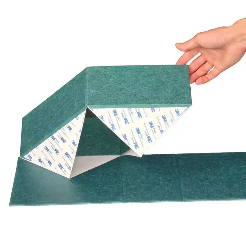 Premium paper box with lid being assembled by hand, featuring 3M adhesive for secure closure—ideal for paper boxes for gifts and custom paper boxes with lids.