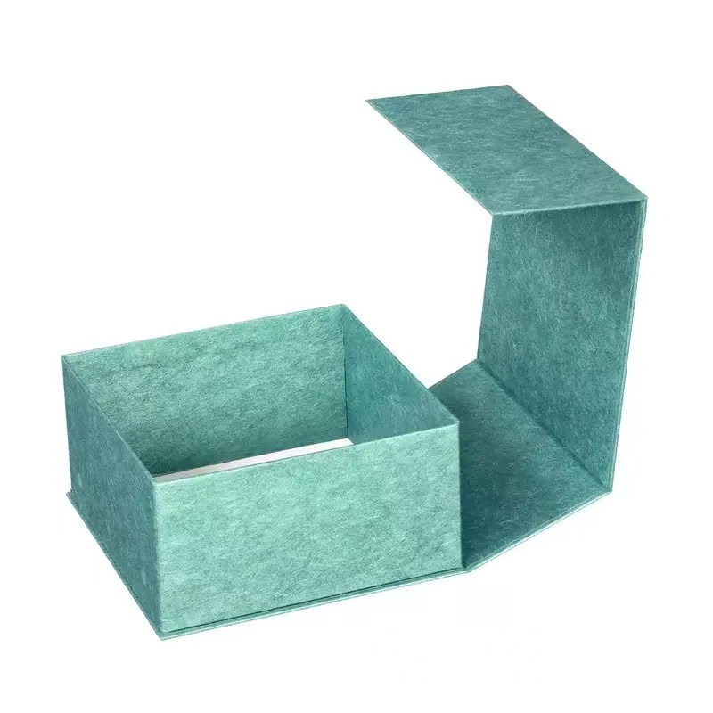 Premium green paper box with lid open, elegant design for paper boxes for gifts and custom paper boxes with lids—ideal for household use.