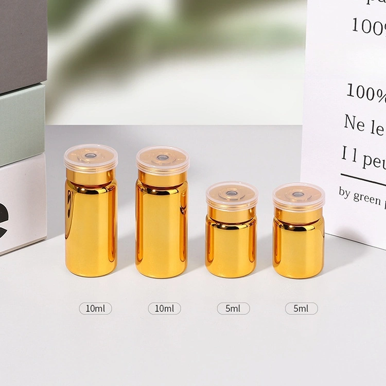 Electroplated vials in silver and gold, made of borosilicate glass, with airtight butyl rubber stoppers and aluminum caps, suitable for laboratory samples and cosmetics.
