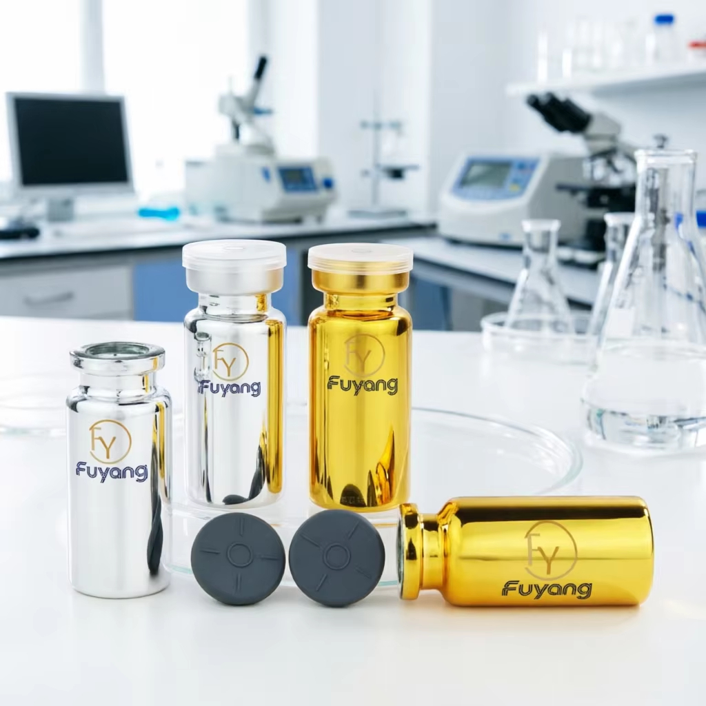 Electroplated vials in silver and gold, made of borosilicate glass, with airtight butyl rubber stoppers and aluminum caps, suitable for laboratory samples and cosmetics.