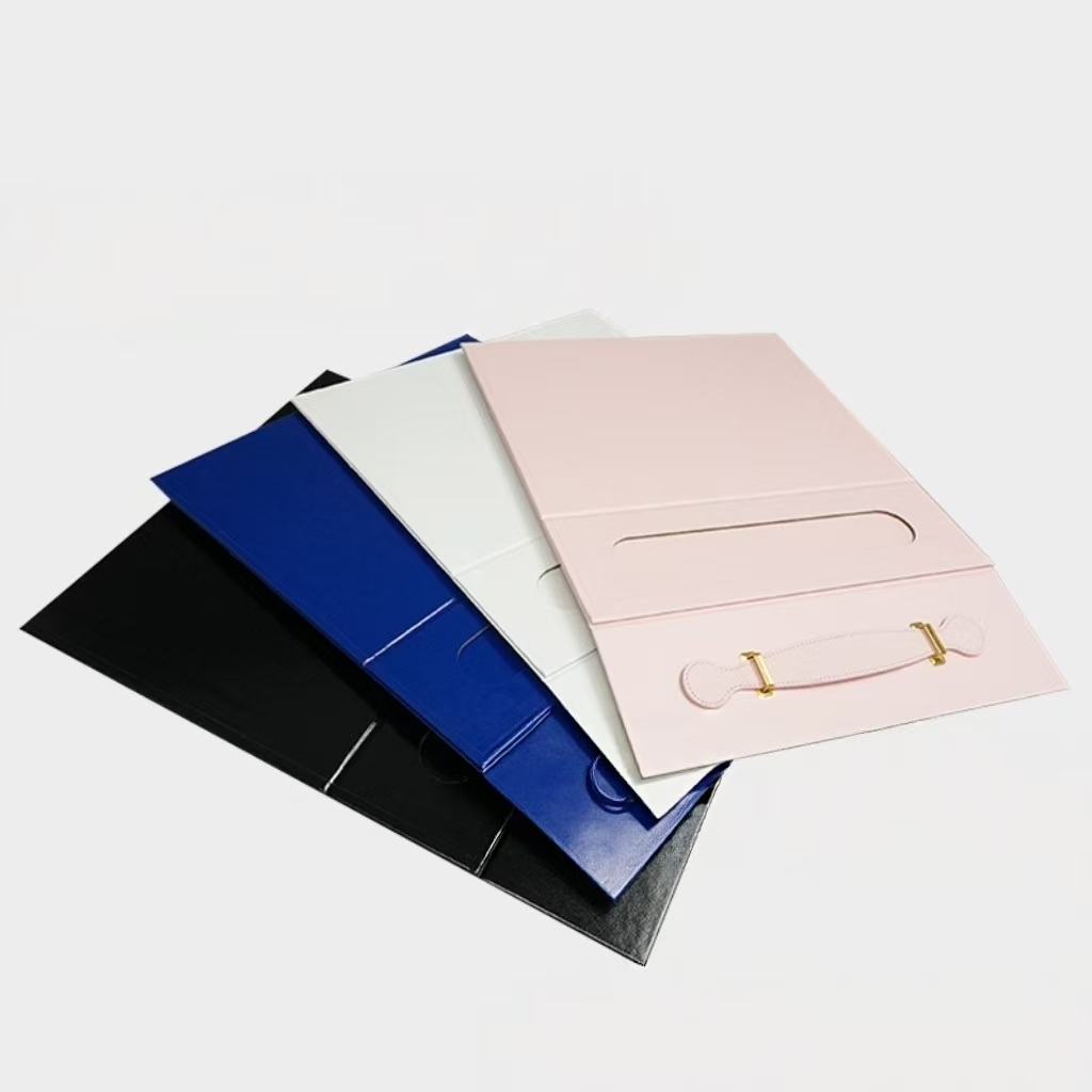 Four-color PU leather gift boxes – pink, white, black, blue – with metal handles