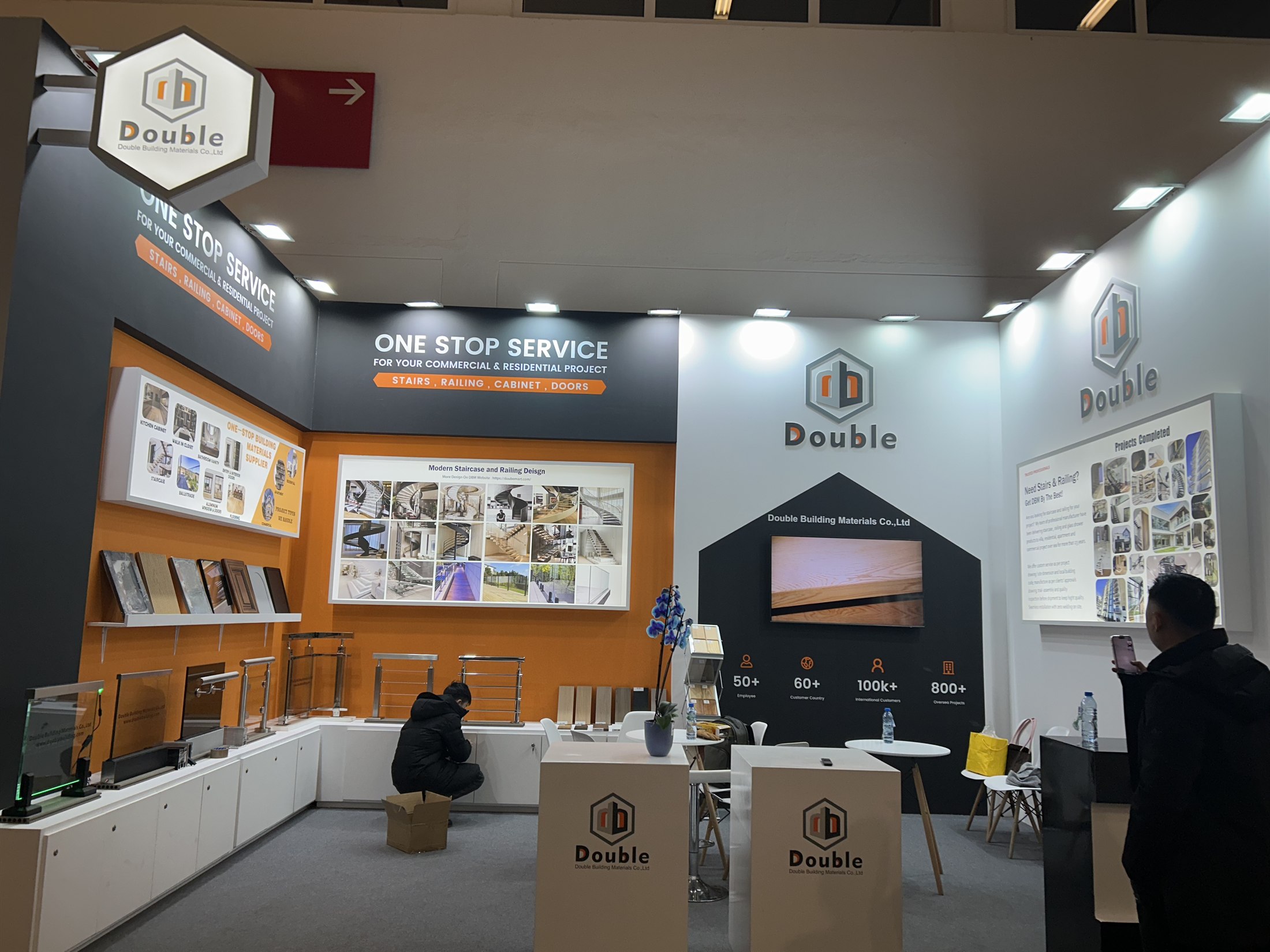 Wide view of the Double Building stand at BAU 2025 with samples along the counters