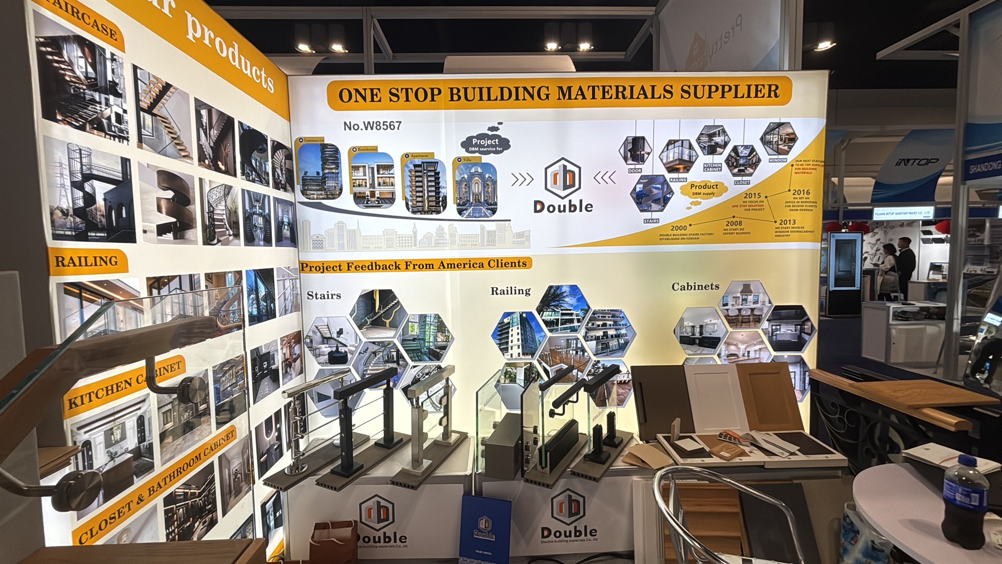 Double Building booth W8567 with product walls and railing samples