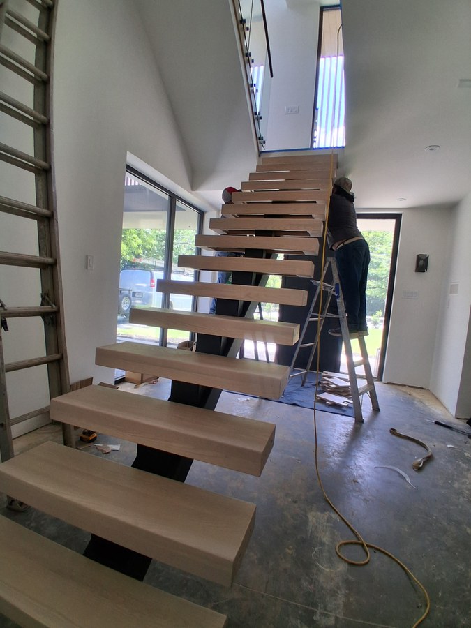 Staircase package unload with telehandler in Atlanta