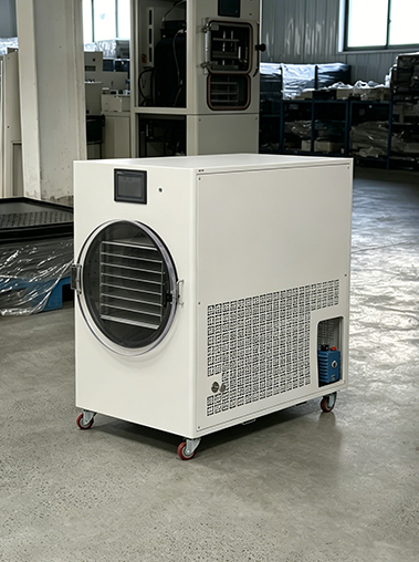 Geliss home freeze dryer side perspective view real shot on the production floor, highlighting the large square ventilation cooling grid and the integrated built-in blue vacuum pump compartment