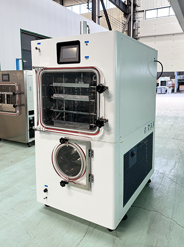 Three-quarter right view real shot of a commercial laboratory freeze dryer machine on wheels, highlighting the robust door latches and side cooling ventilation layout.