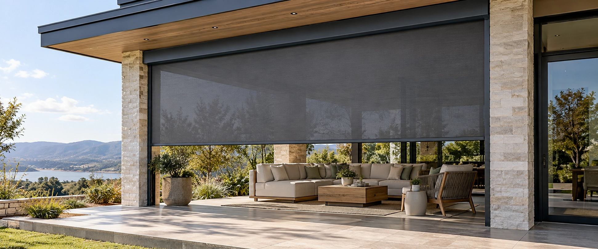 Motorized outdoor ZIP screen shading a finished patio