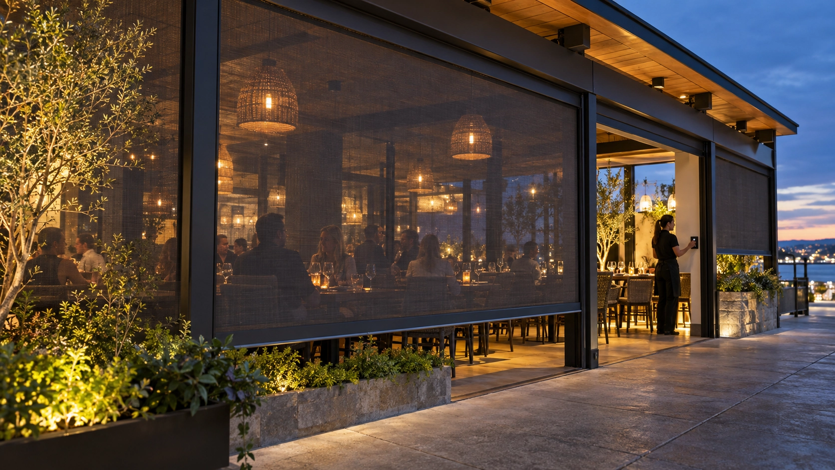 ZIP screen installed between restaurant patio posts with cassette and side guides