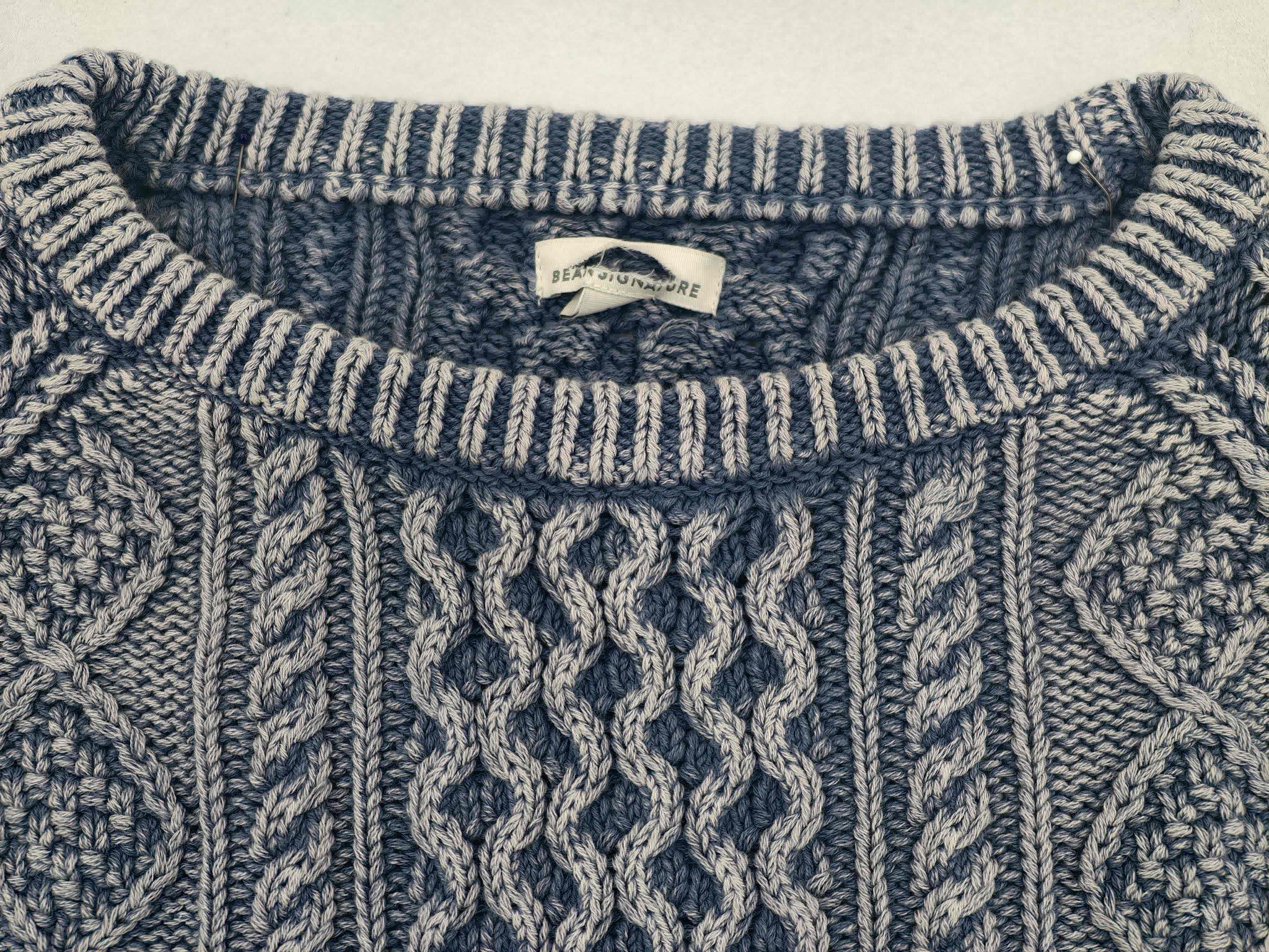 Striped crew neckline and interior brand label