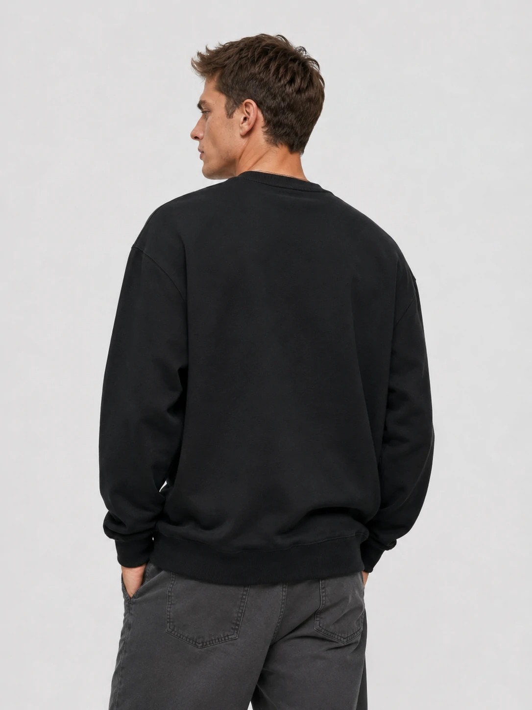 Back view of heavyweight black cotton sweatshirt