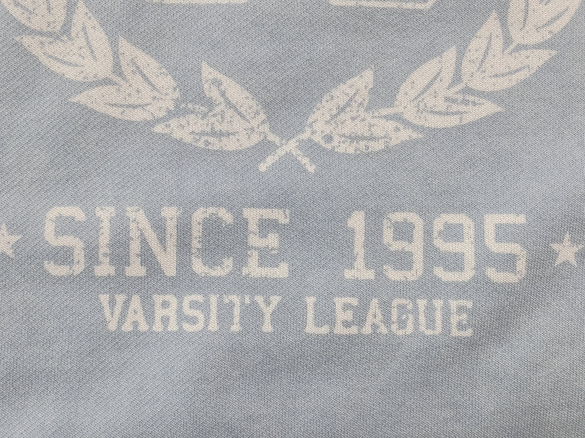 Screen printed vintage graphic on washed cotton surface