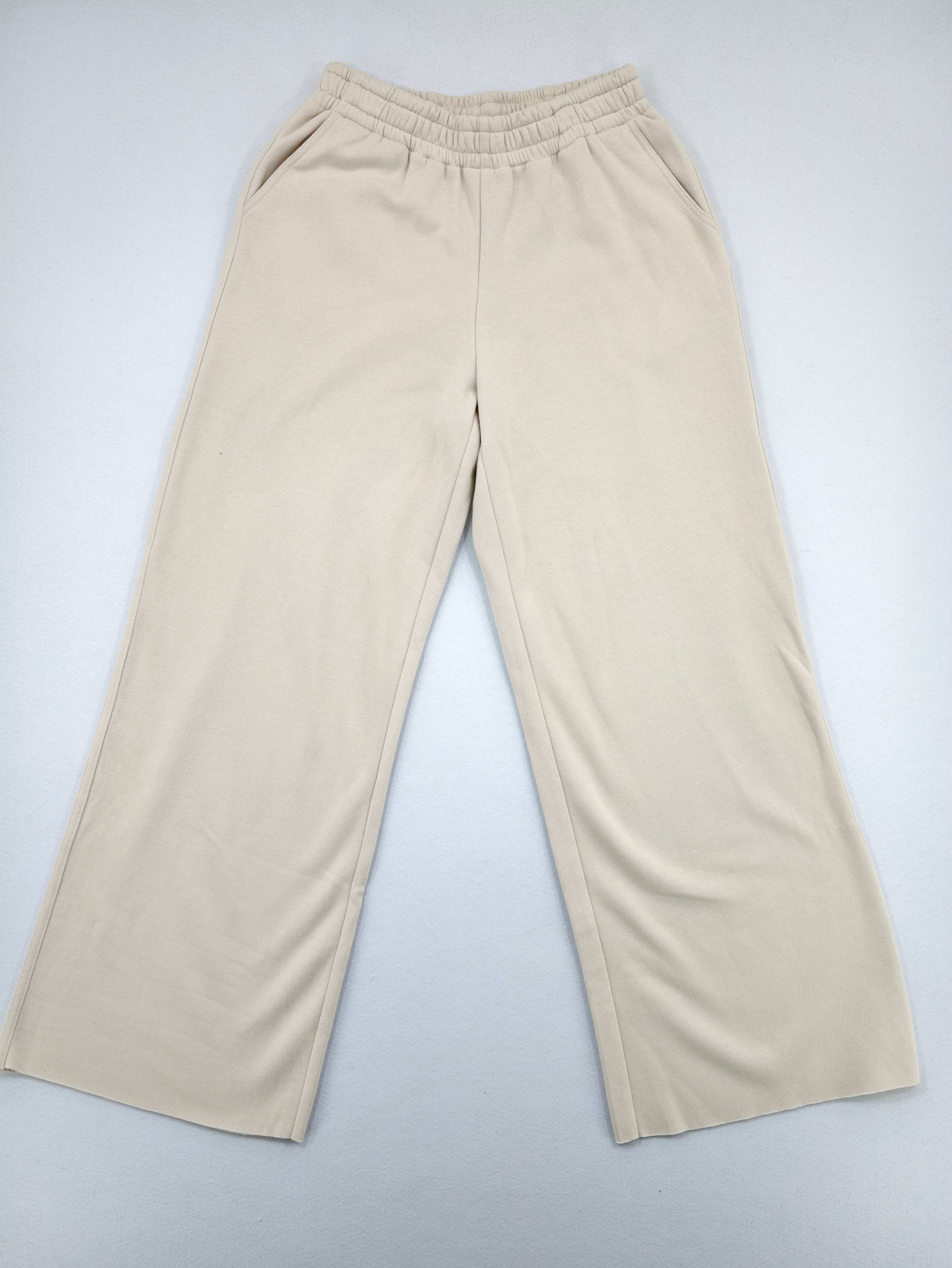 Ivory French terry wide-leg pants front flat view