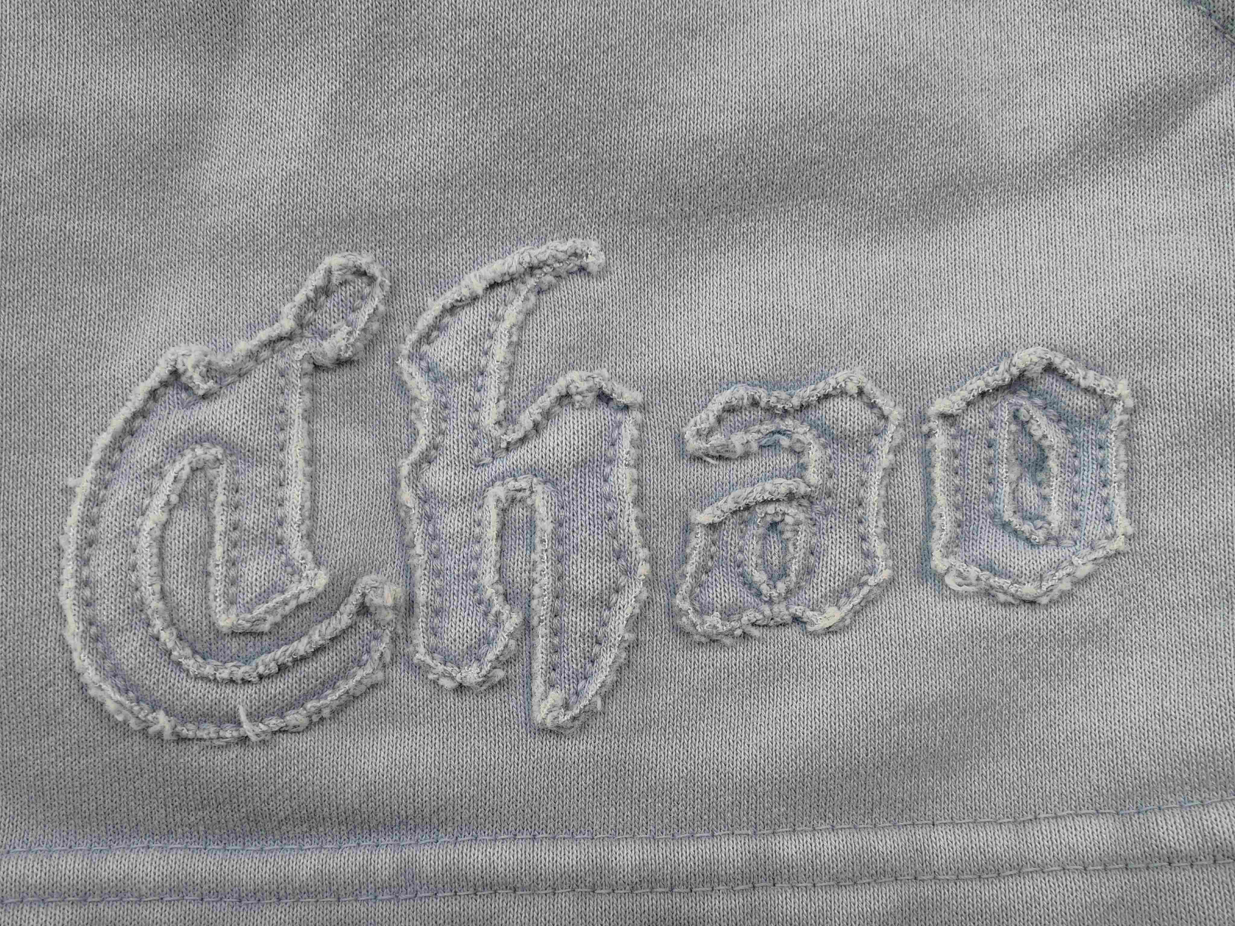Tonal appliqué embroidery on washed cotton French terry