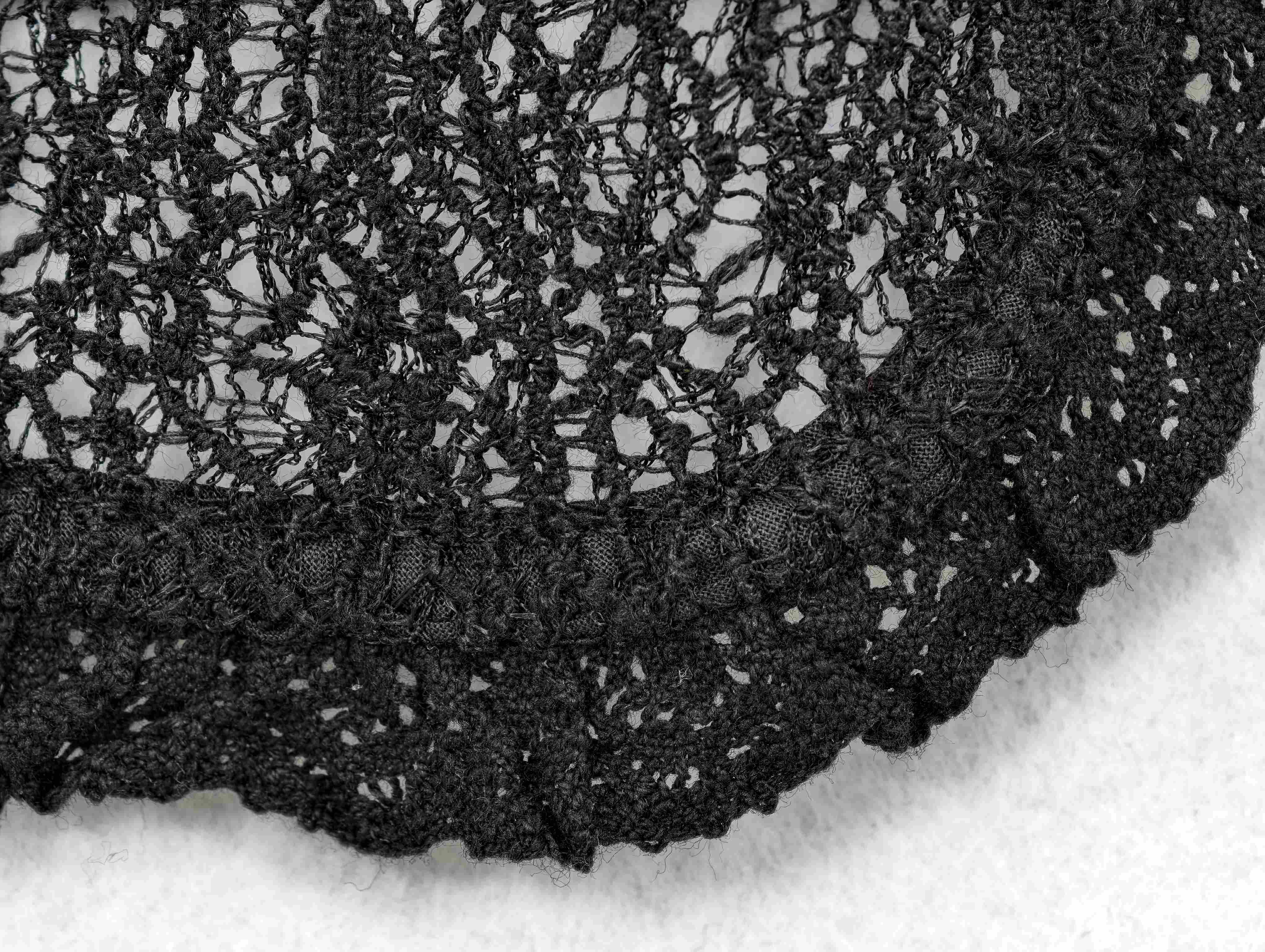 Stretch mesh texture with ruffled pocket edge