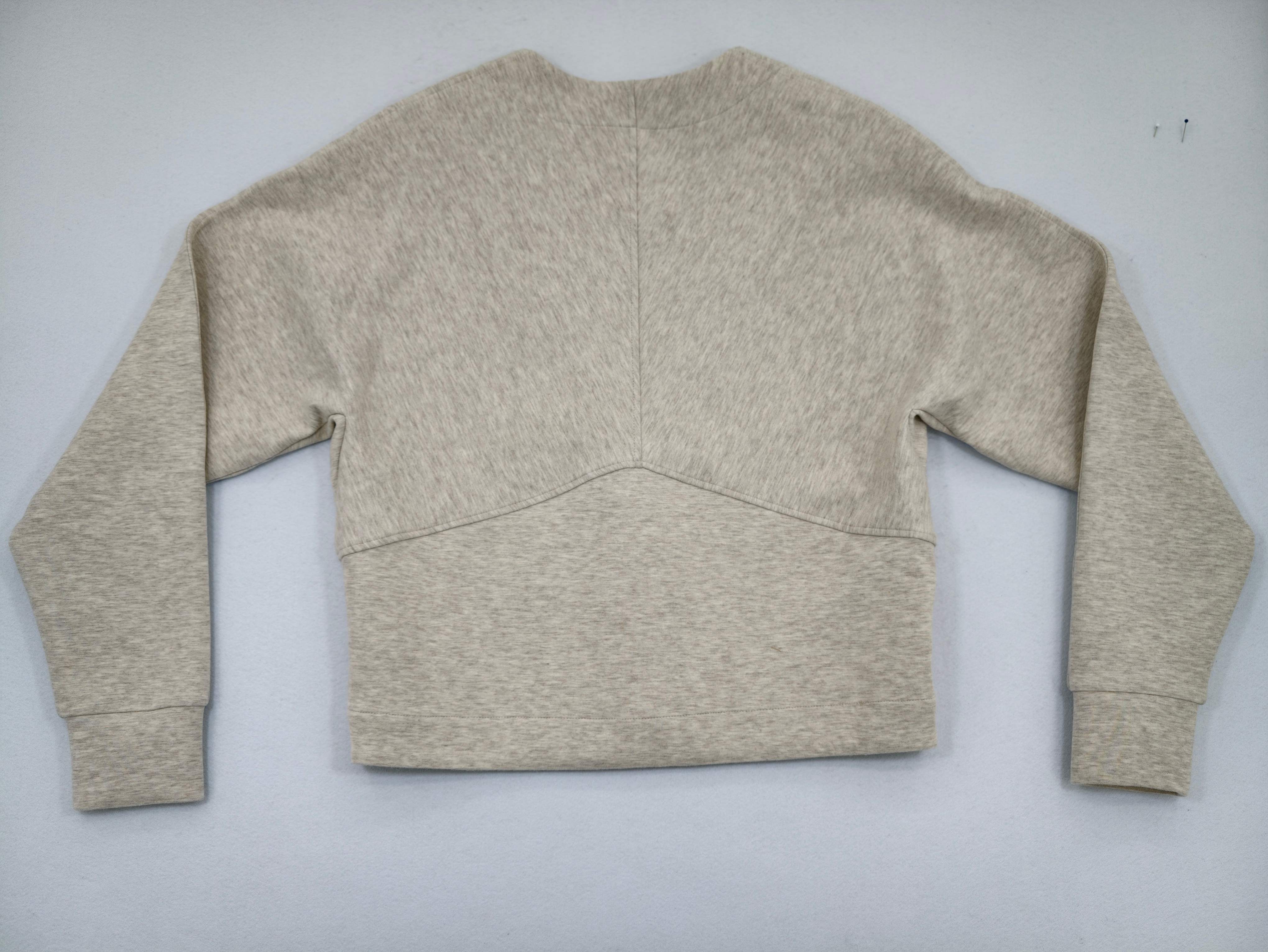 Cropped cardigan back construction for custom apparel brands