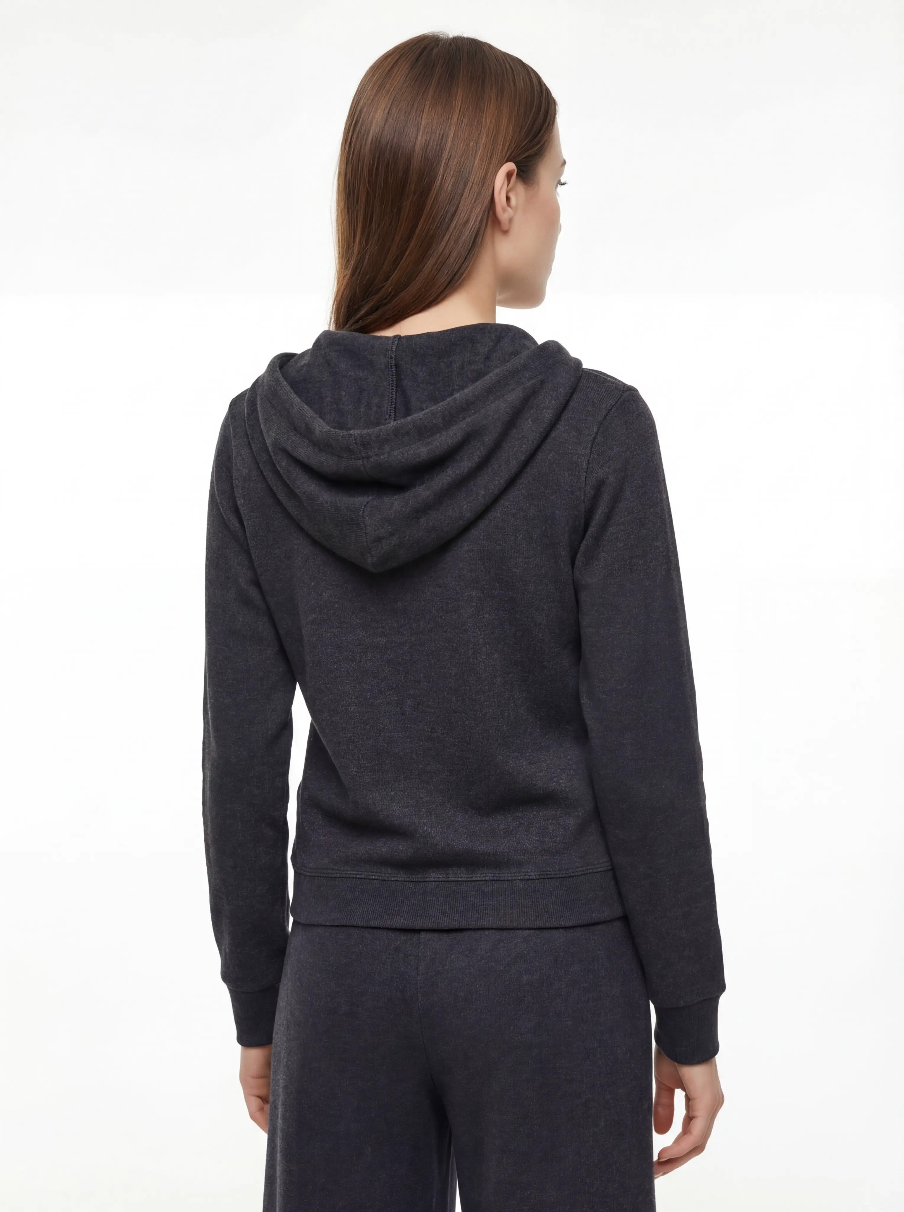 Back view showing relaxed hood and fitted silhouette