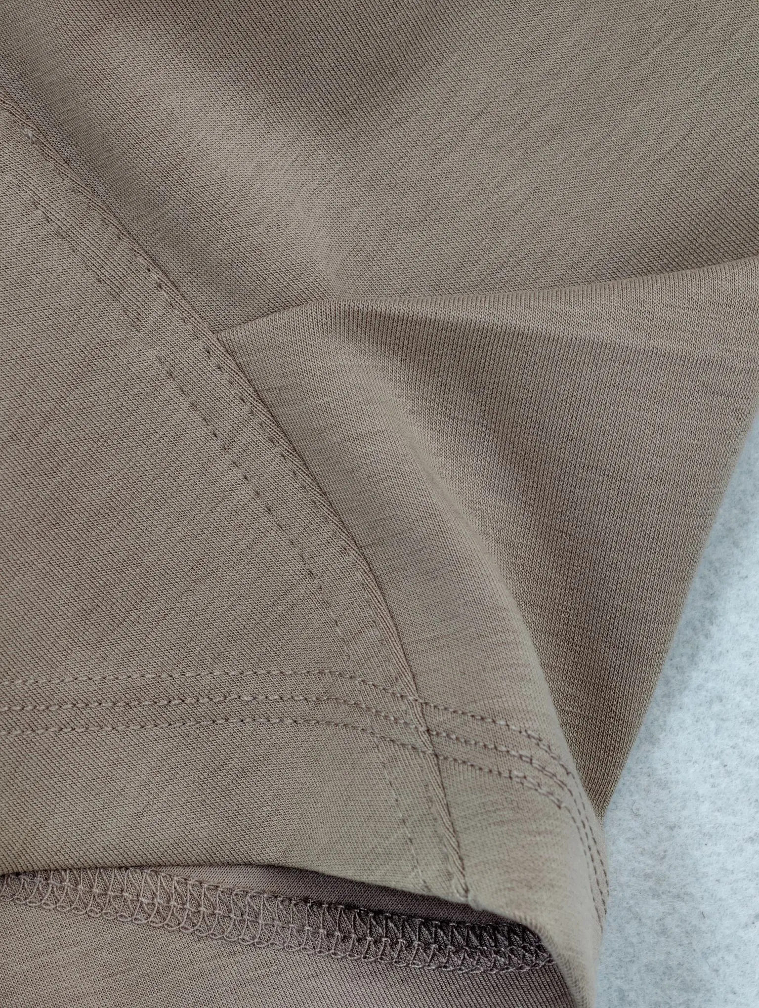 Diagonal contour seam with reinforced interior stitching