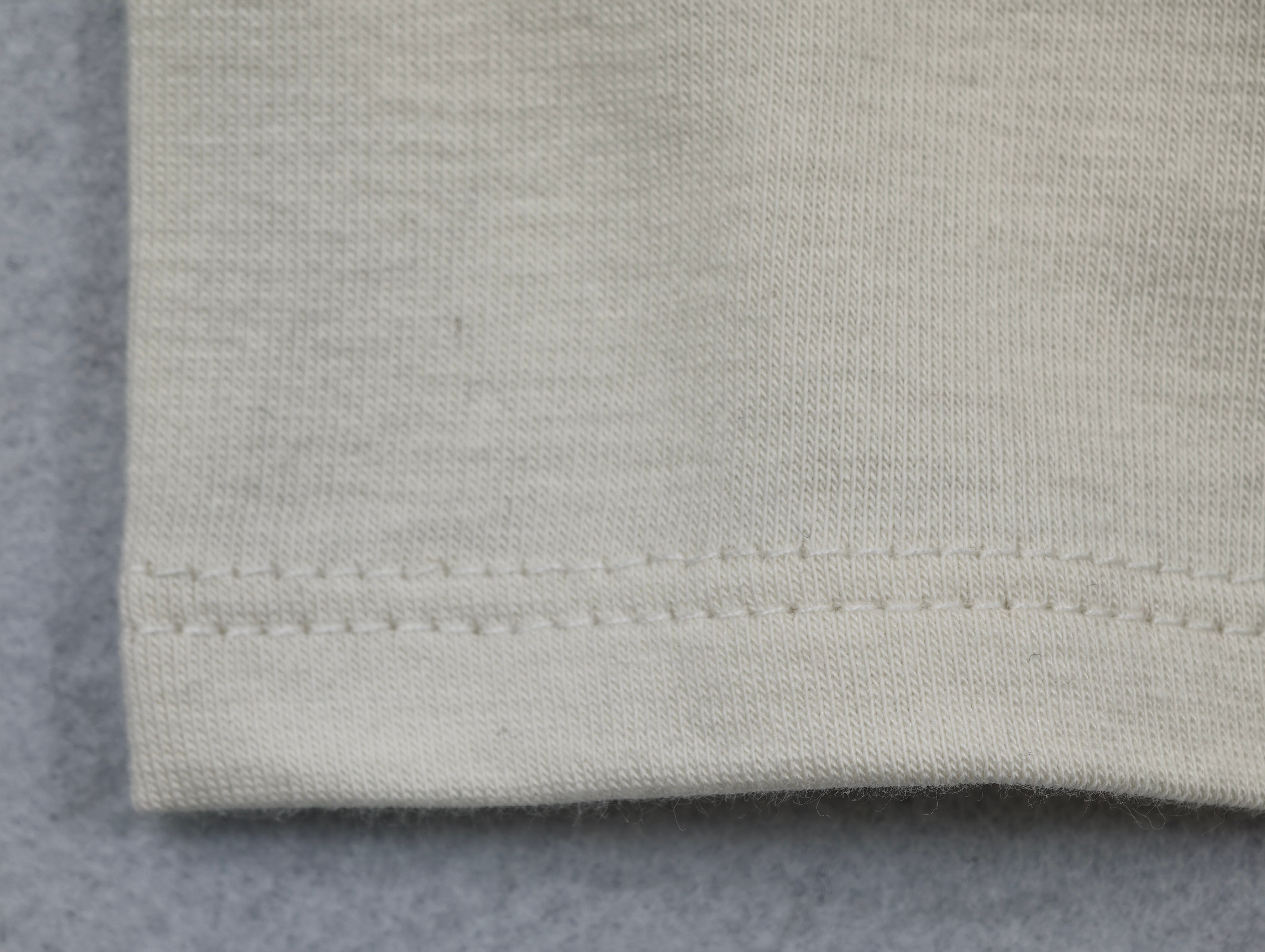 Smooth jersey face with twin-needle hem stitching