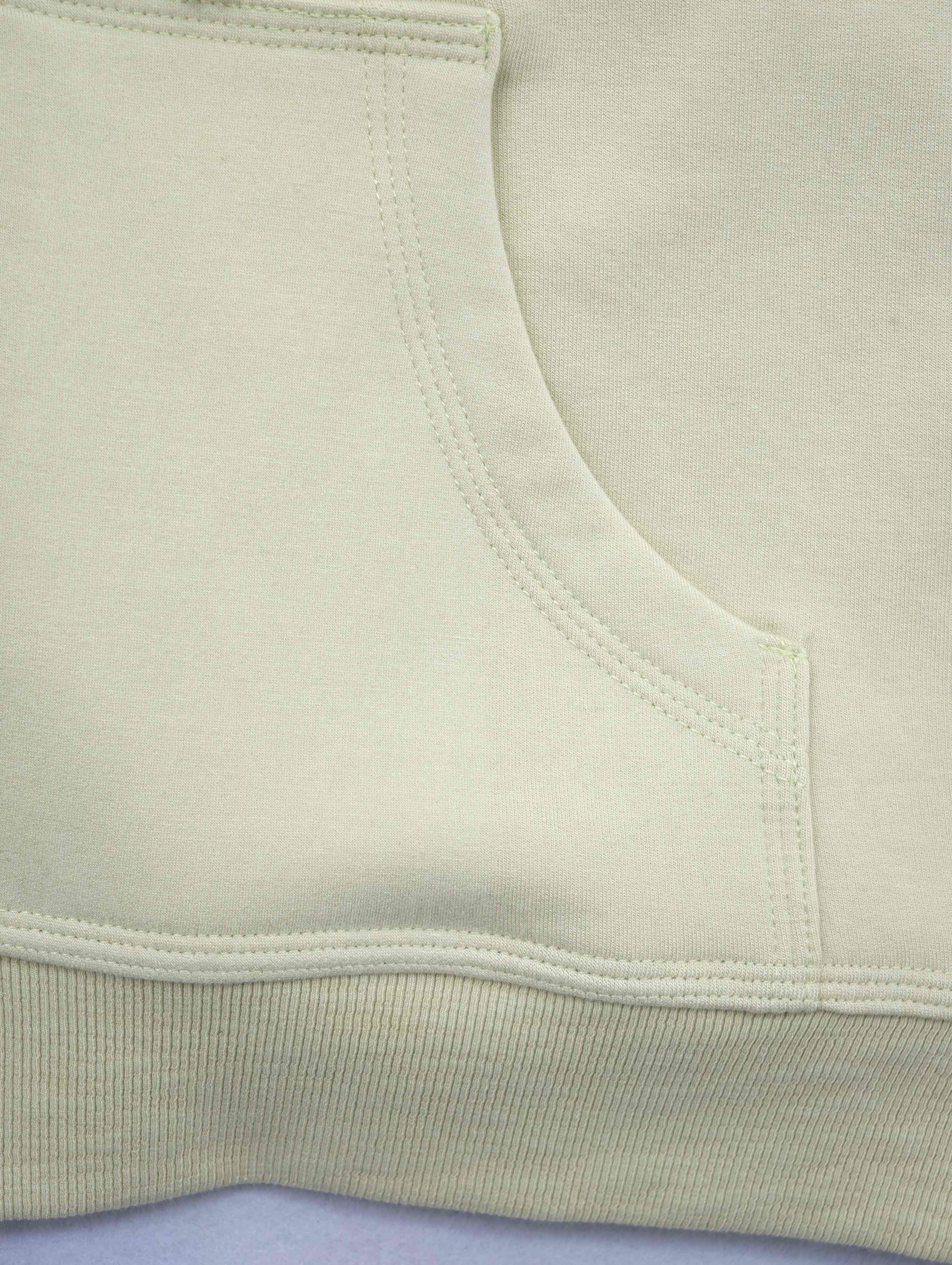 Split kangaroo pocket with ribbed hem finish