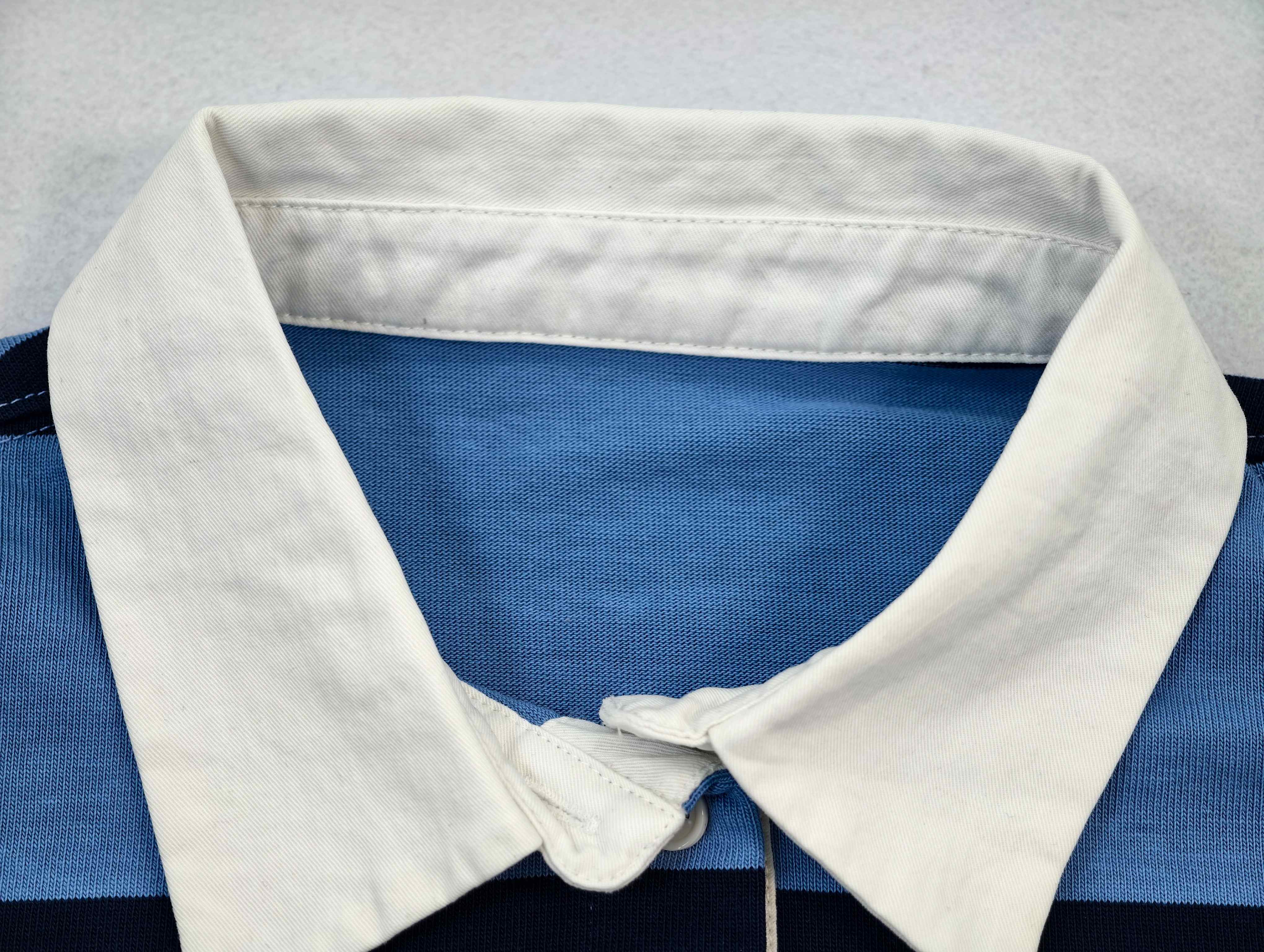 Contrast woven collar and button placket construction close-up