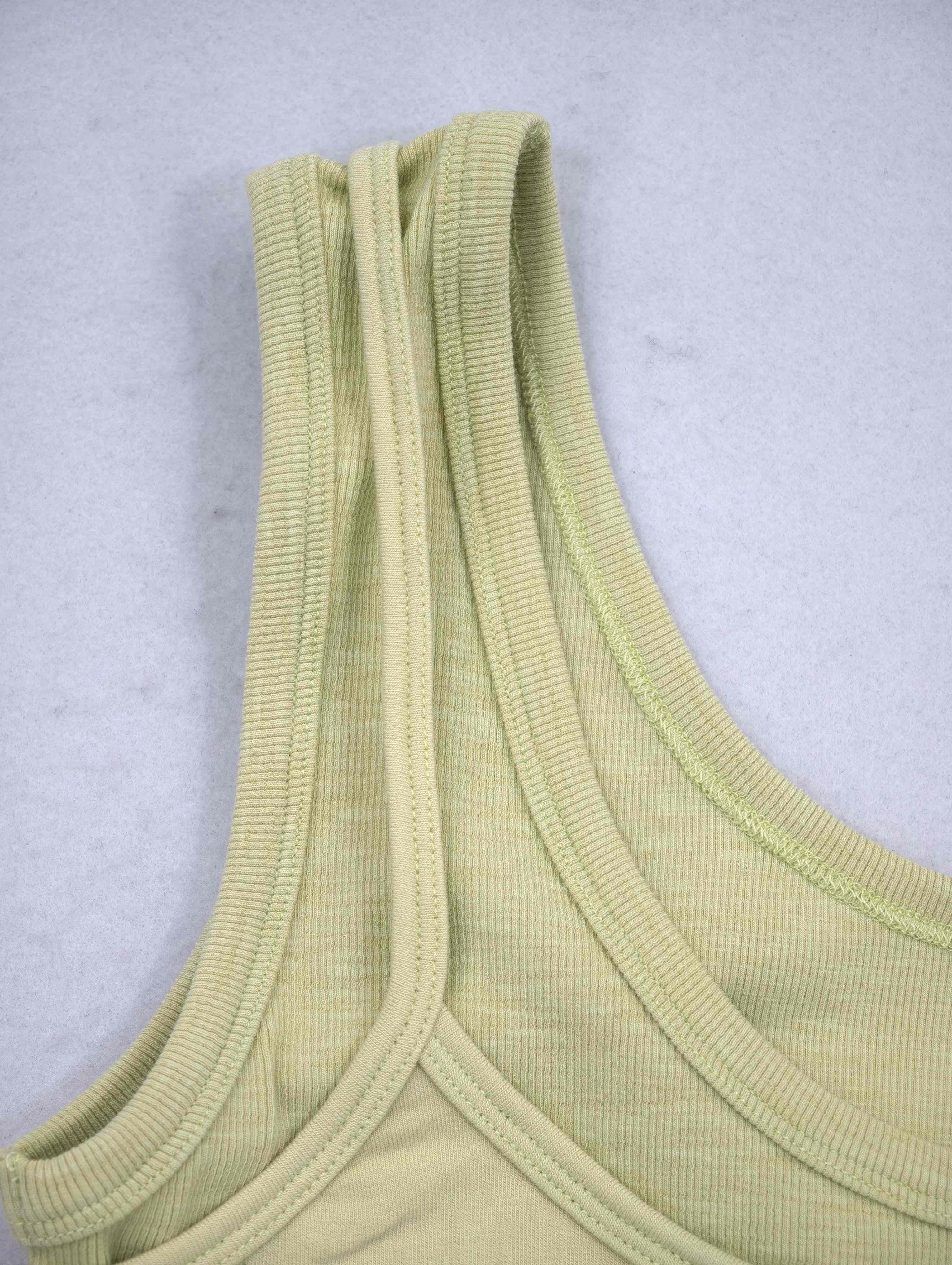 Layered ribbed scoop neckline and wide strap detail