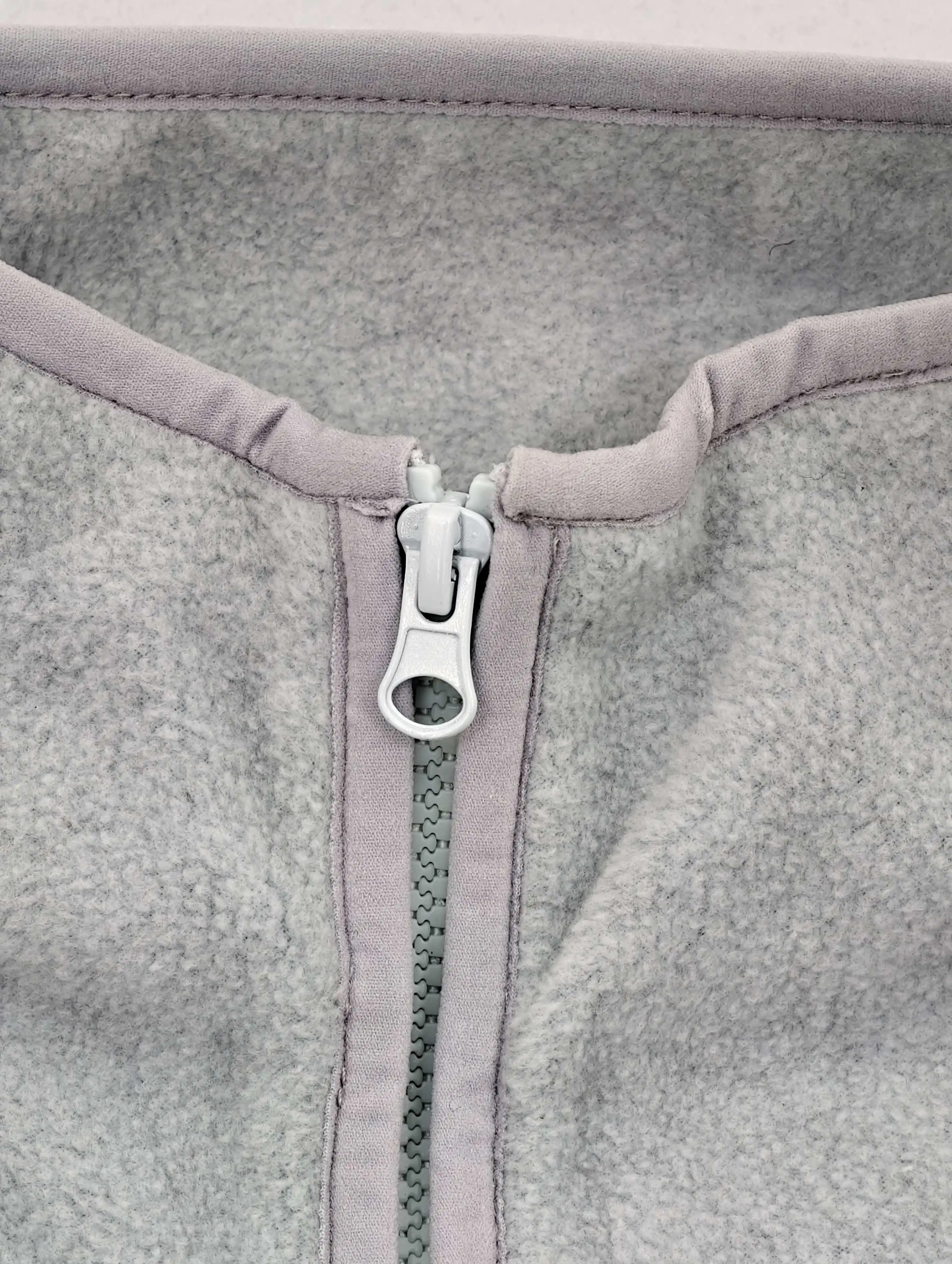 Stand collar and half-zip fastening with fleece interior