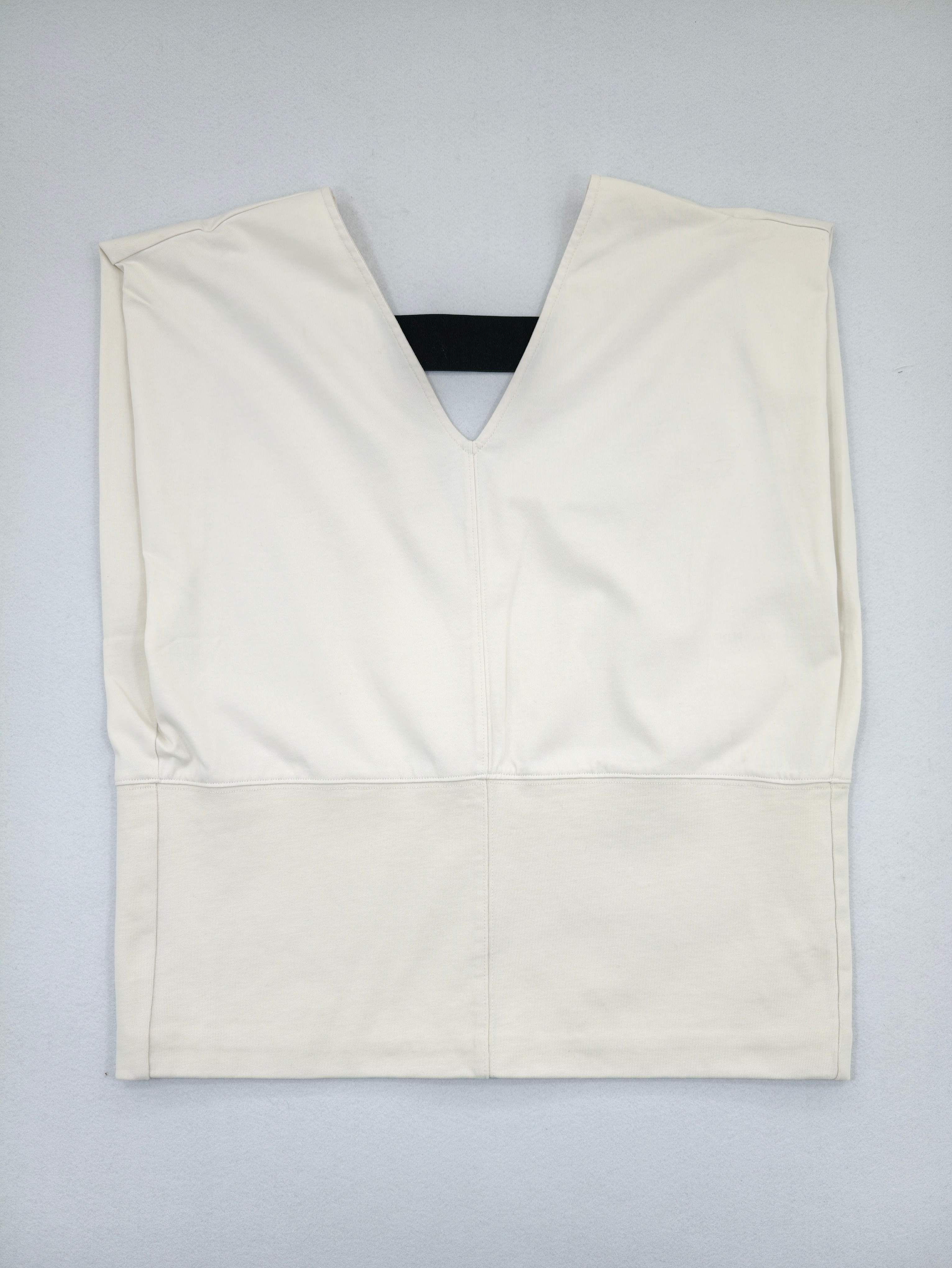 Back view showing structured panels and deep V opening