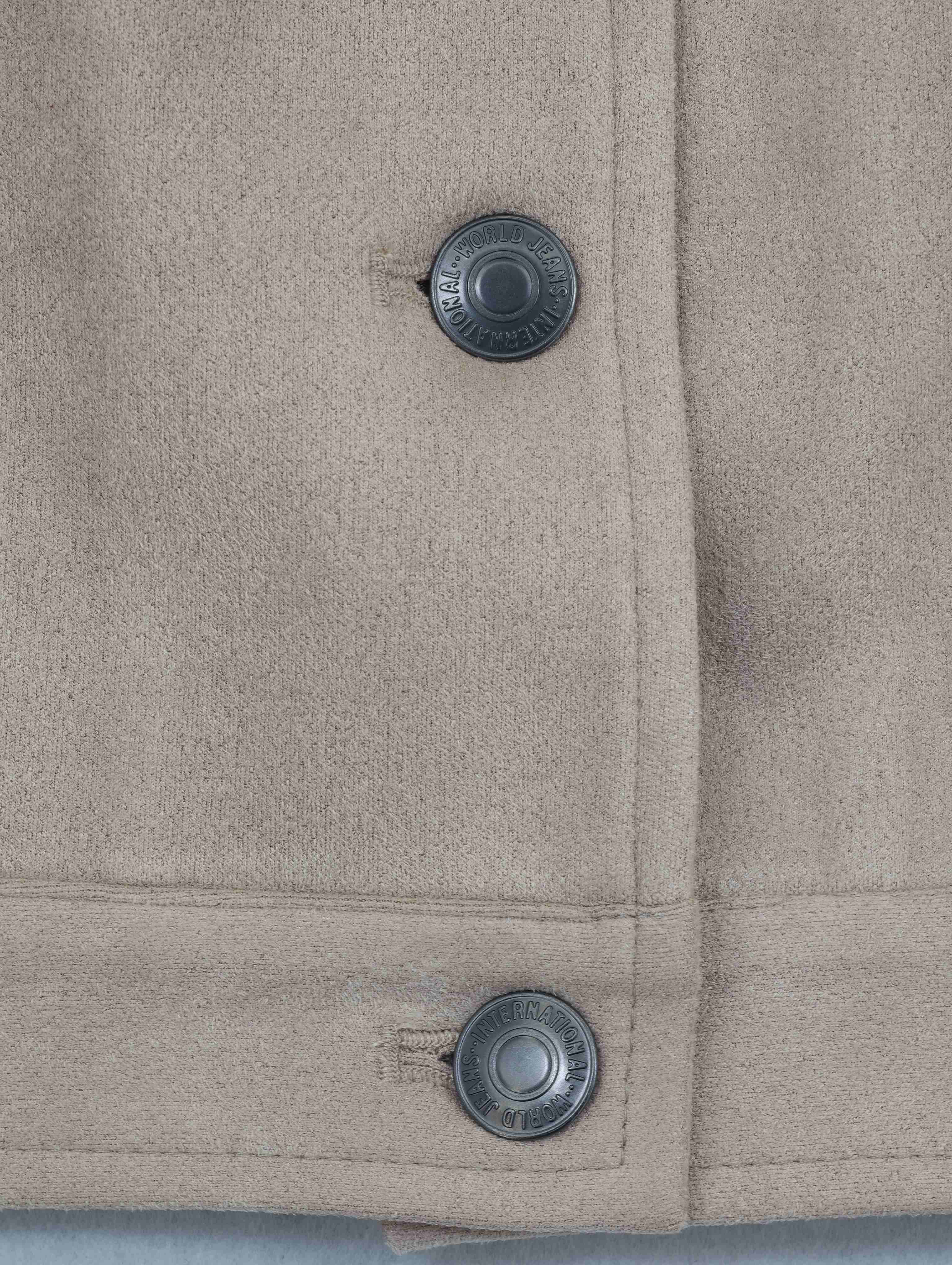 Snap-front placket and reinforced hem construction close-up