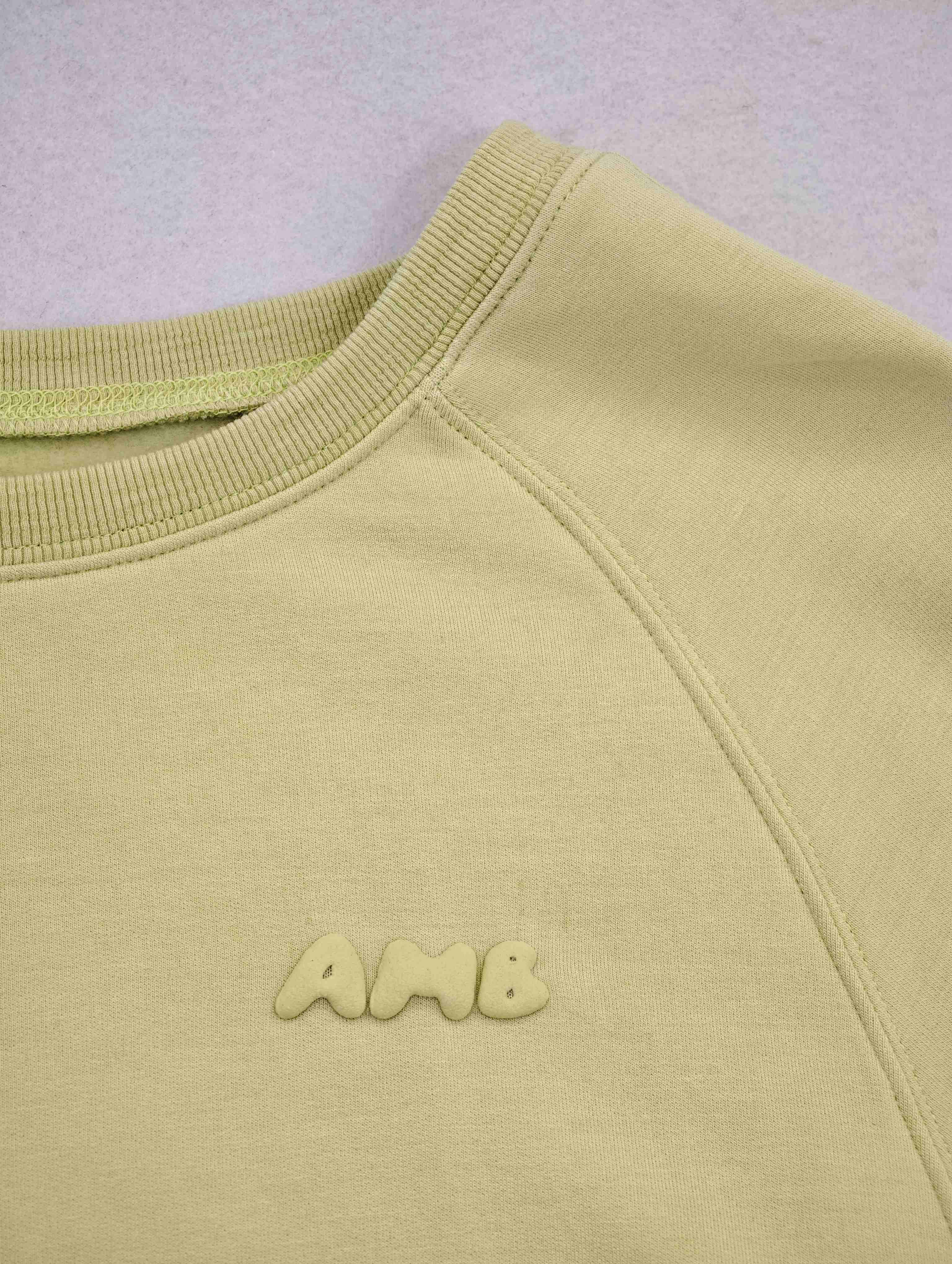 Crew neckline and tonal raised chest logo detail