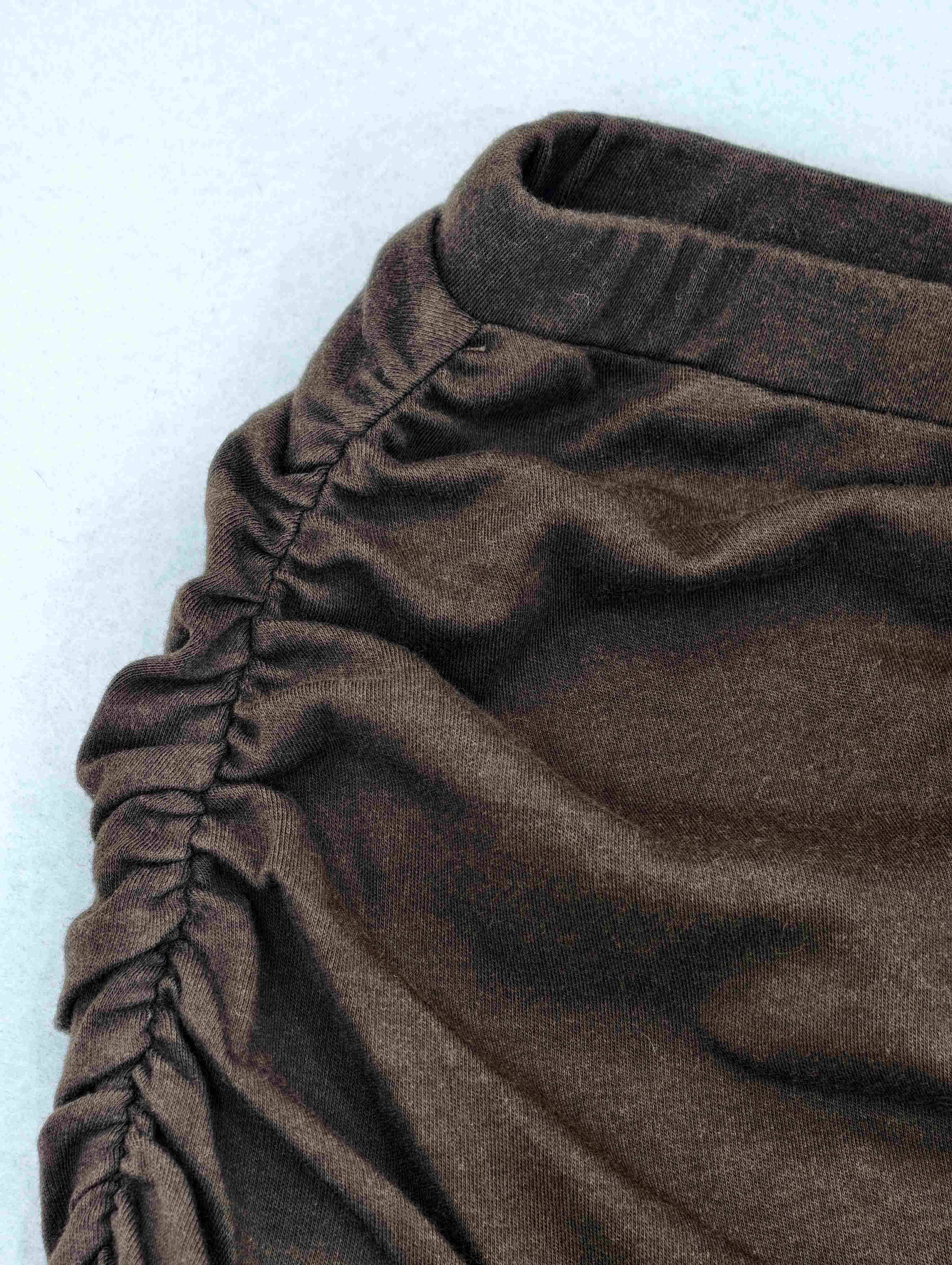 OEM side ruching and waistband construction close-up