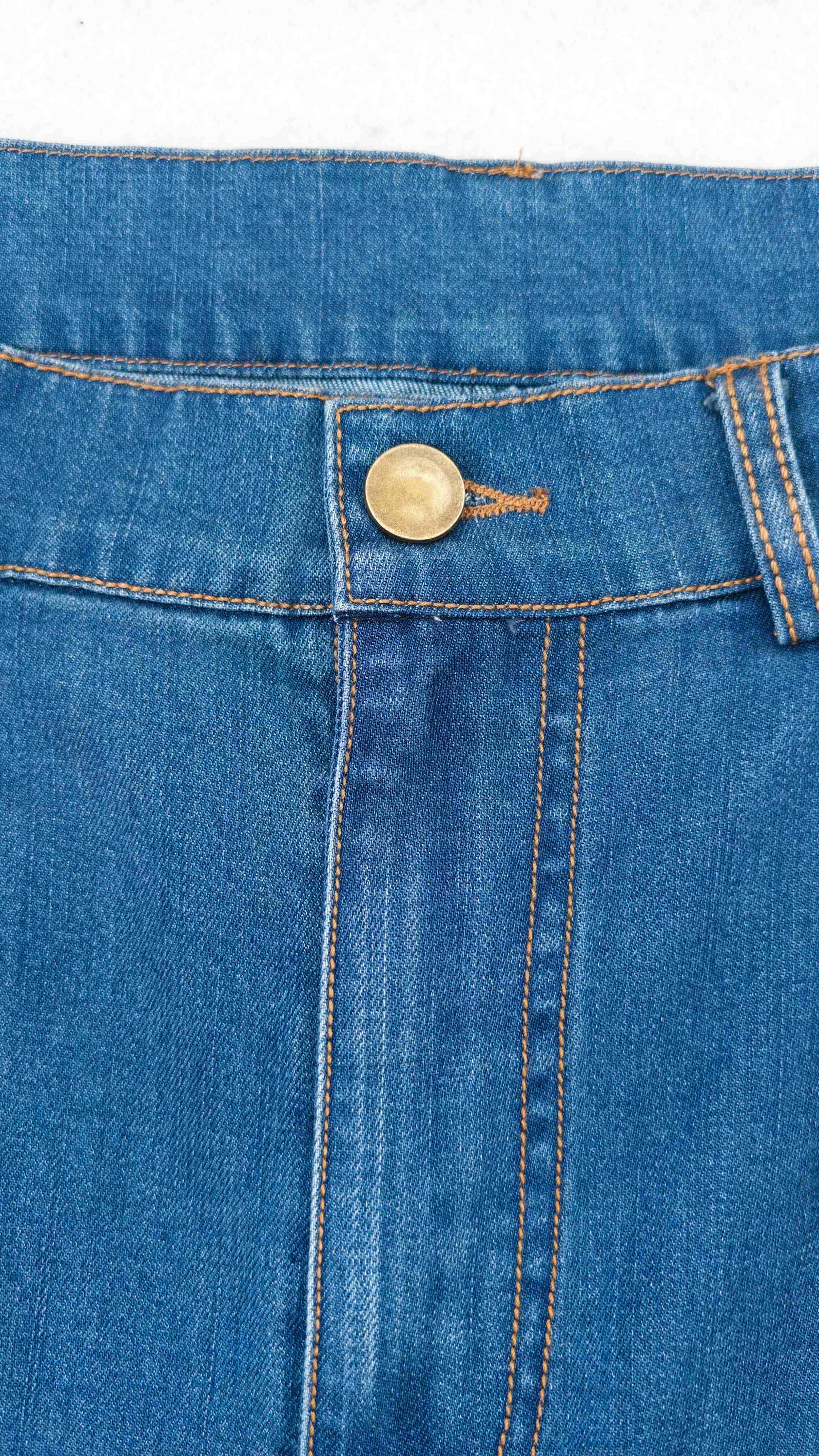 Private label waistband, button and zipper fly detail