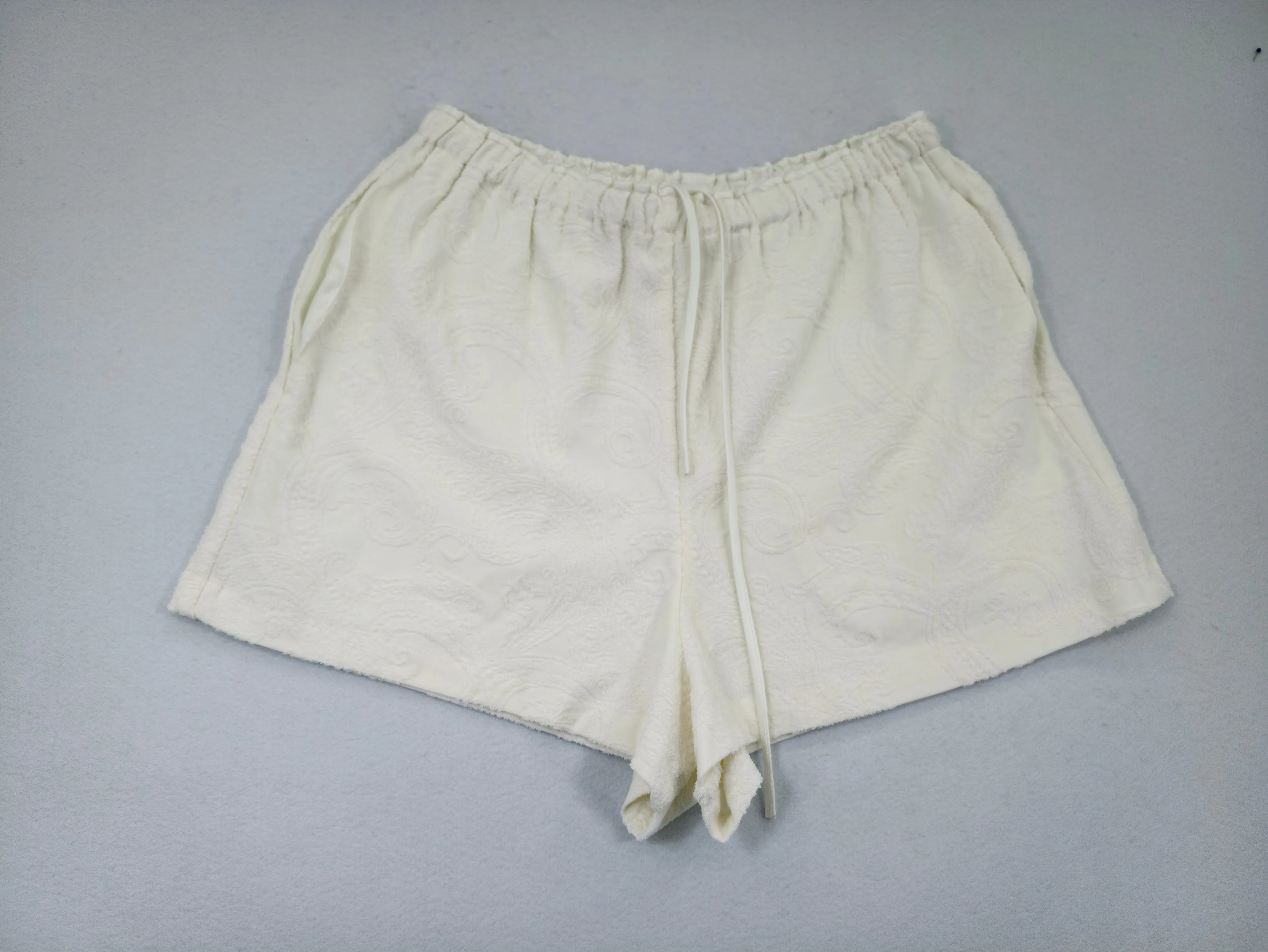Front view of jacquard terry drawstring lounge shorts