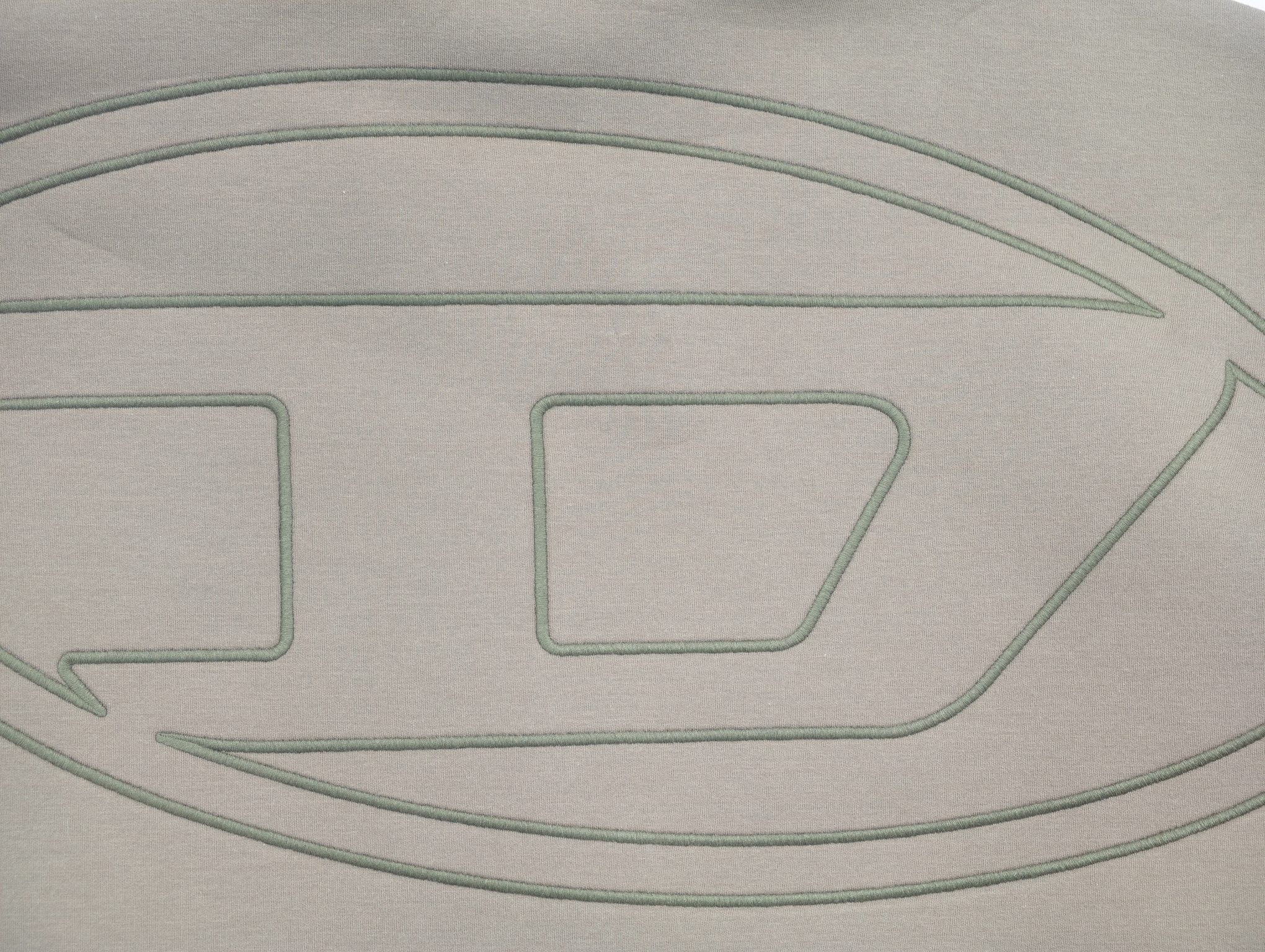 Large tonal back embroidery with outlined stitching