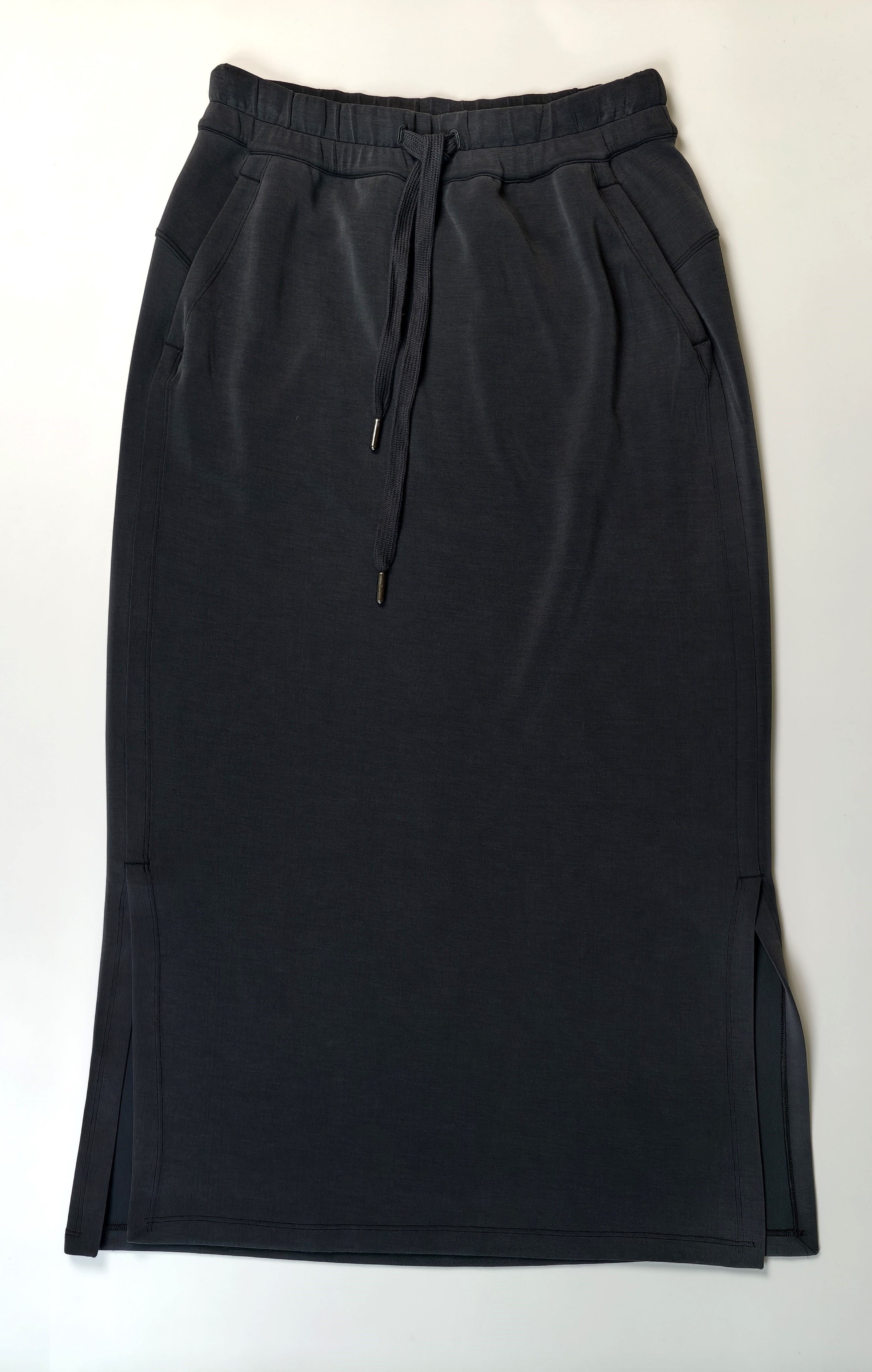 Custom drawstring midi skirt front flat view with side pockets