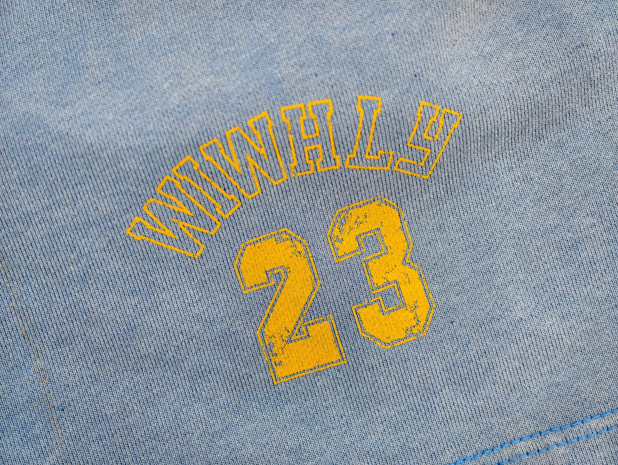 Collegiate number artwork on vintage-washed French terry fabric