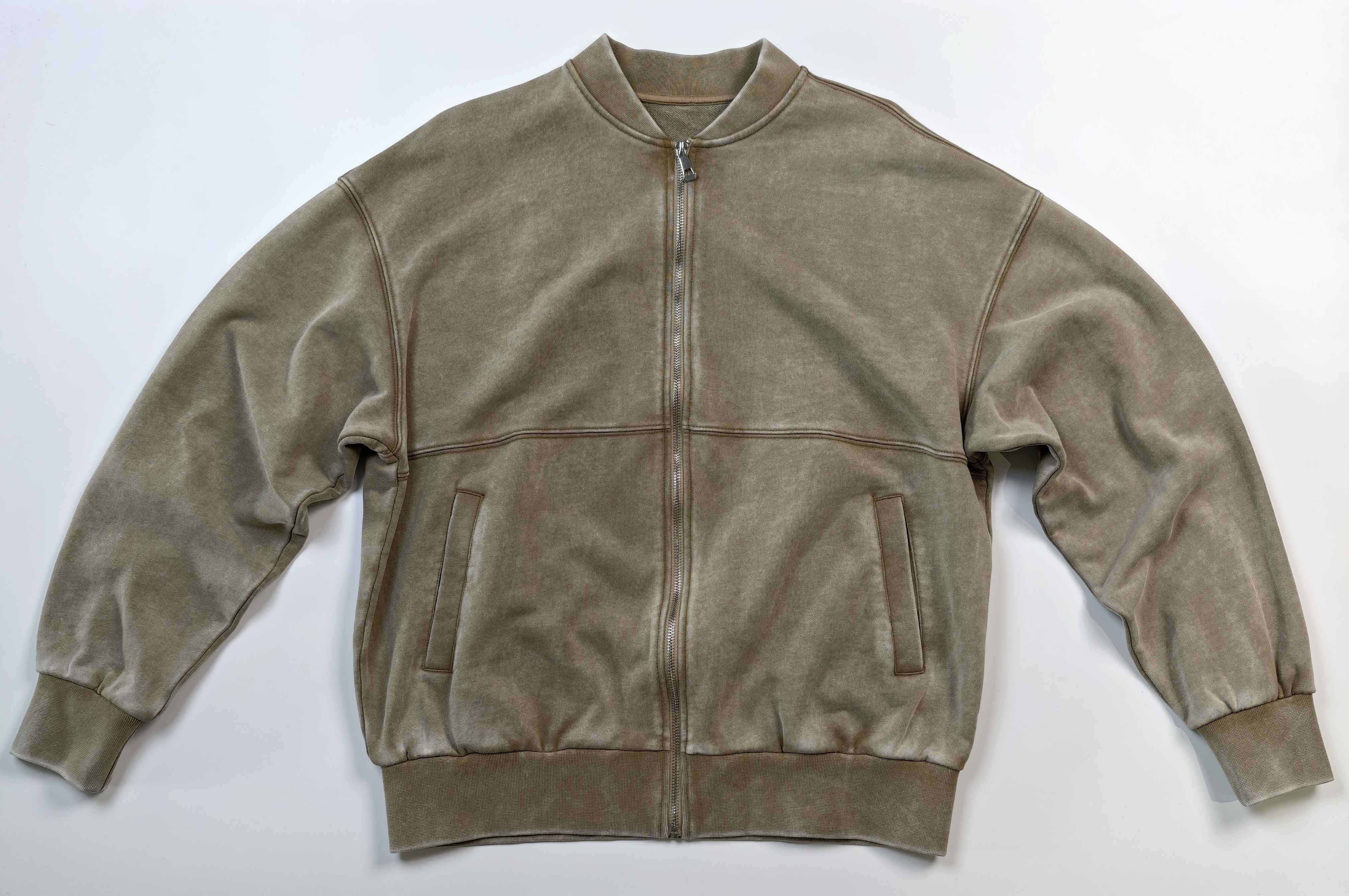 Front zipper and welt pockets on washed cotton jacket