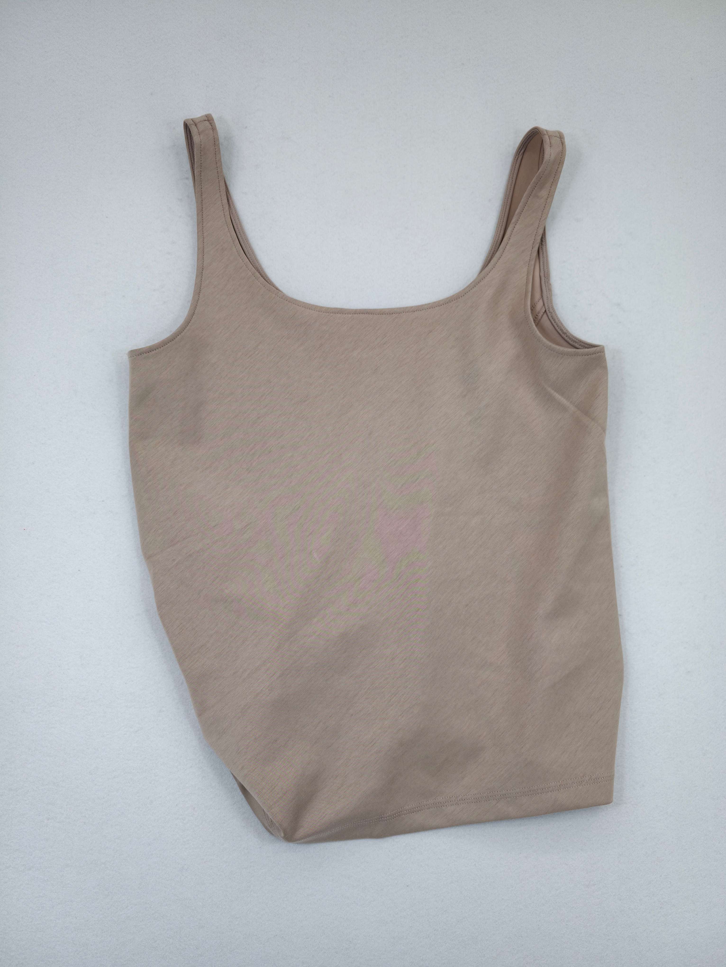 Back view showing wide straps and fitted silhouette