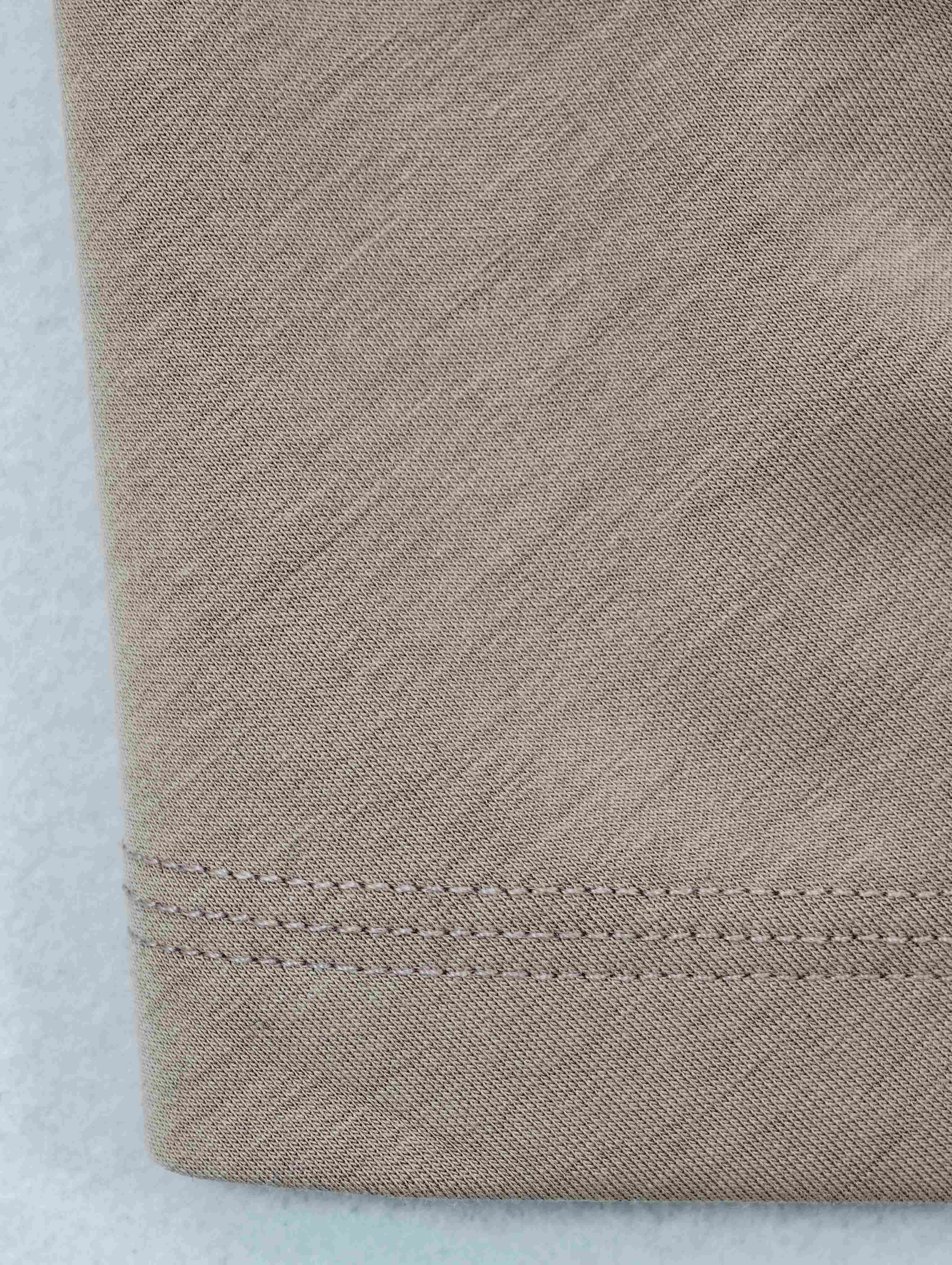 Soft modal-blend jersey with clean stretch hem finish