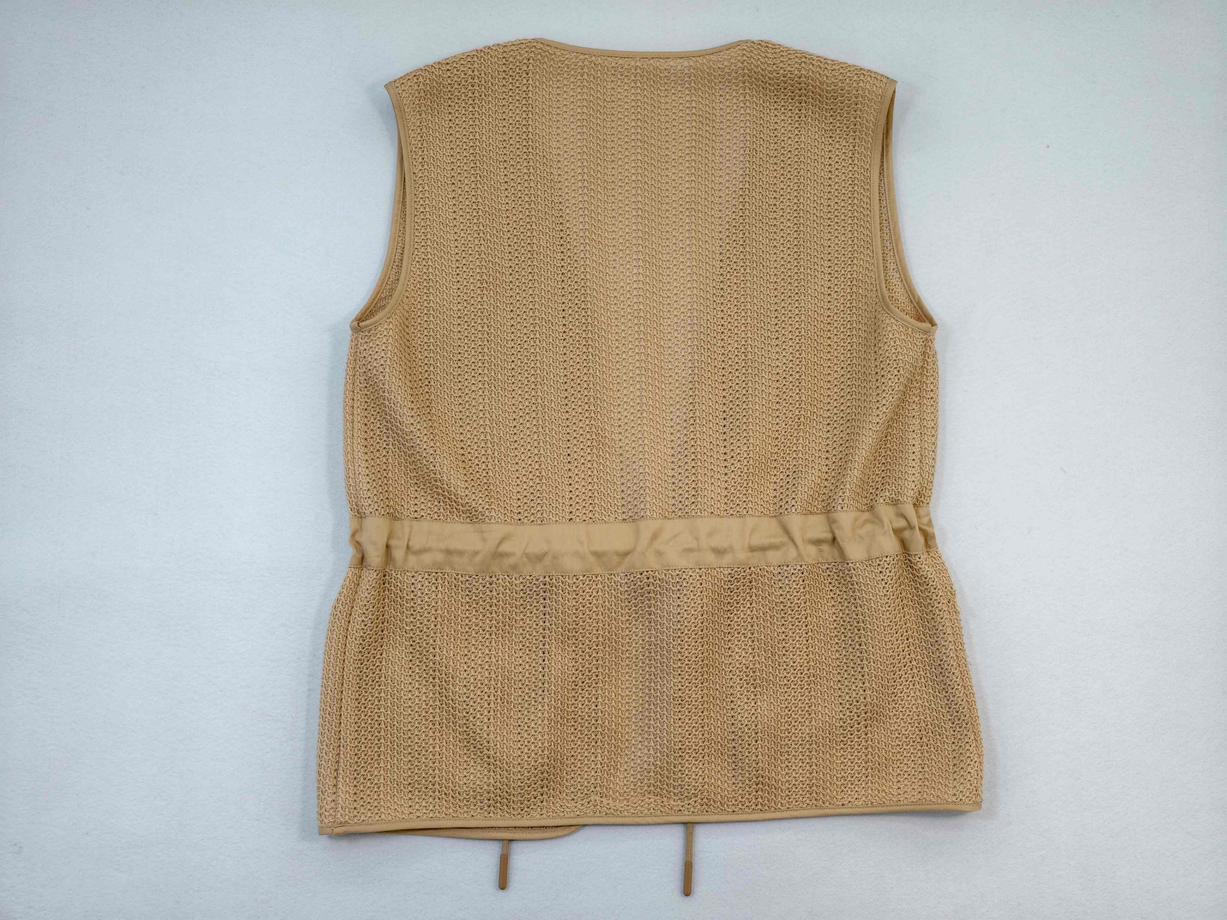 Back view of sleeveless mesh vest with waist channel