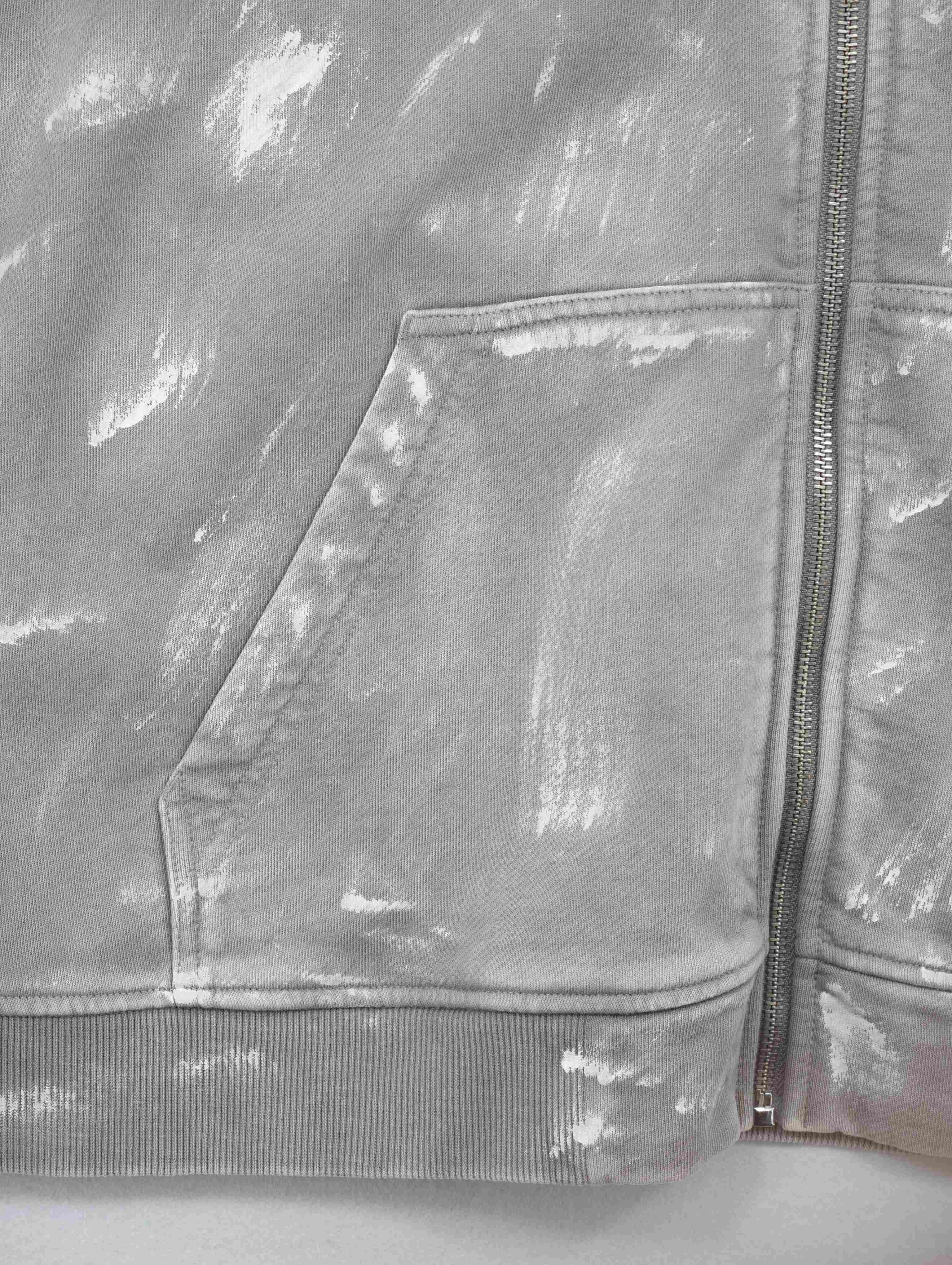 Split front pocket and metal zipper construction detail