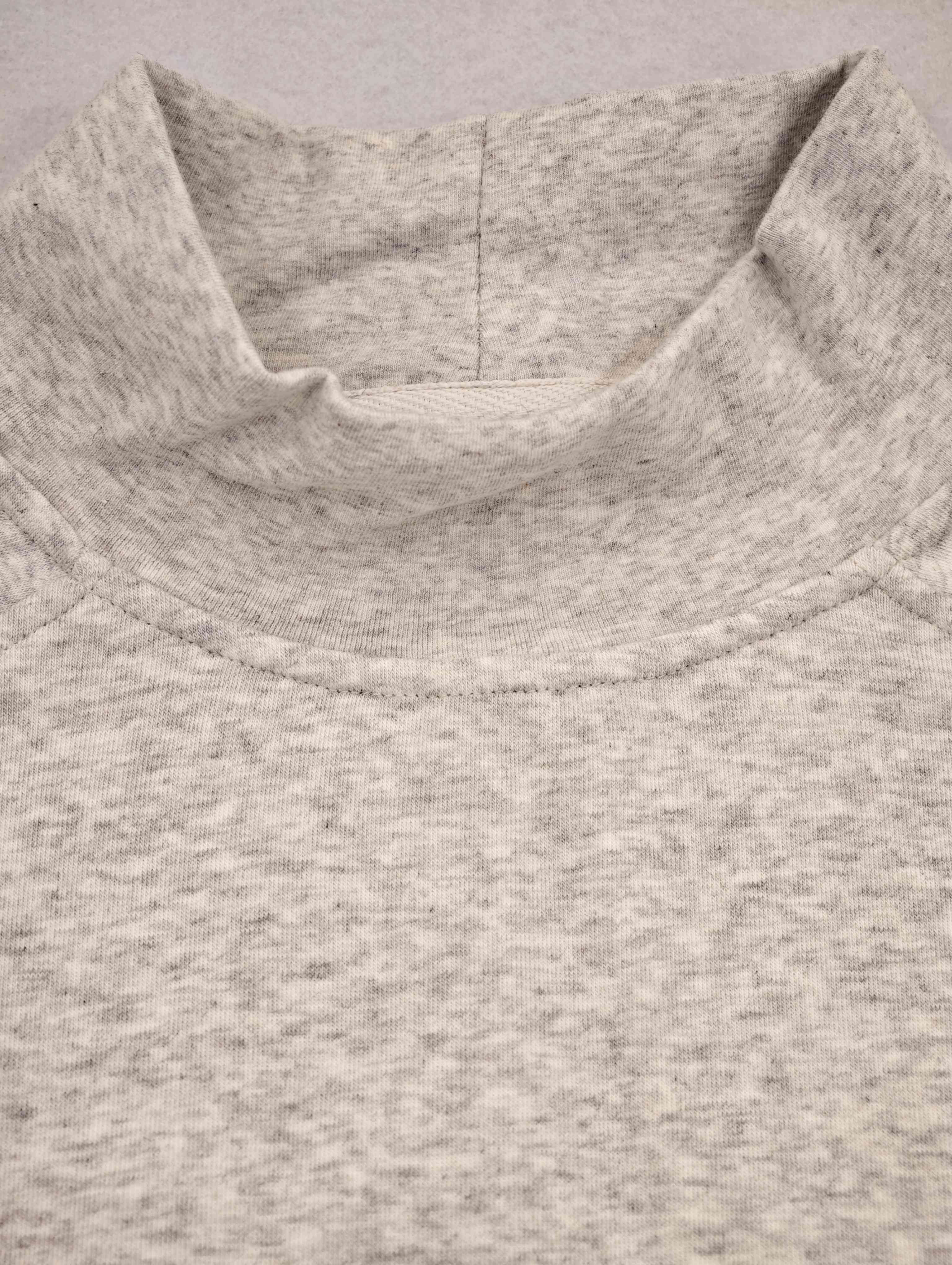 Soft mock neckline construction on cotton-modal knit sweatshirt